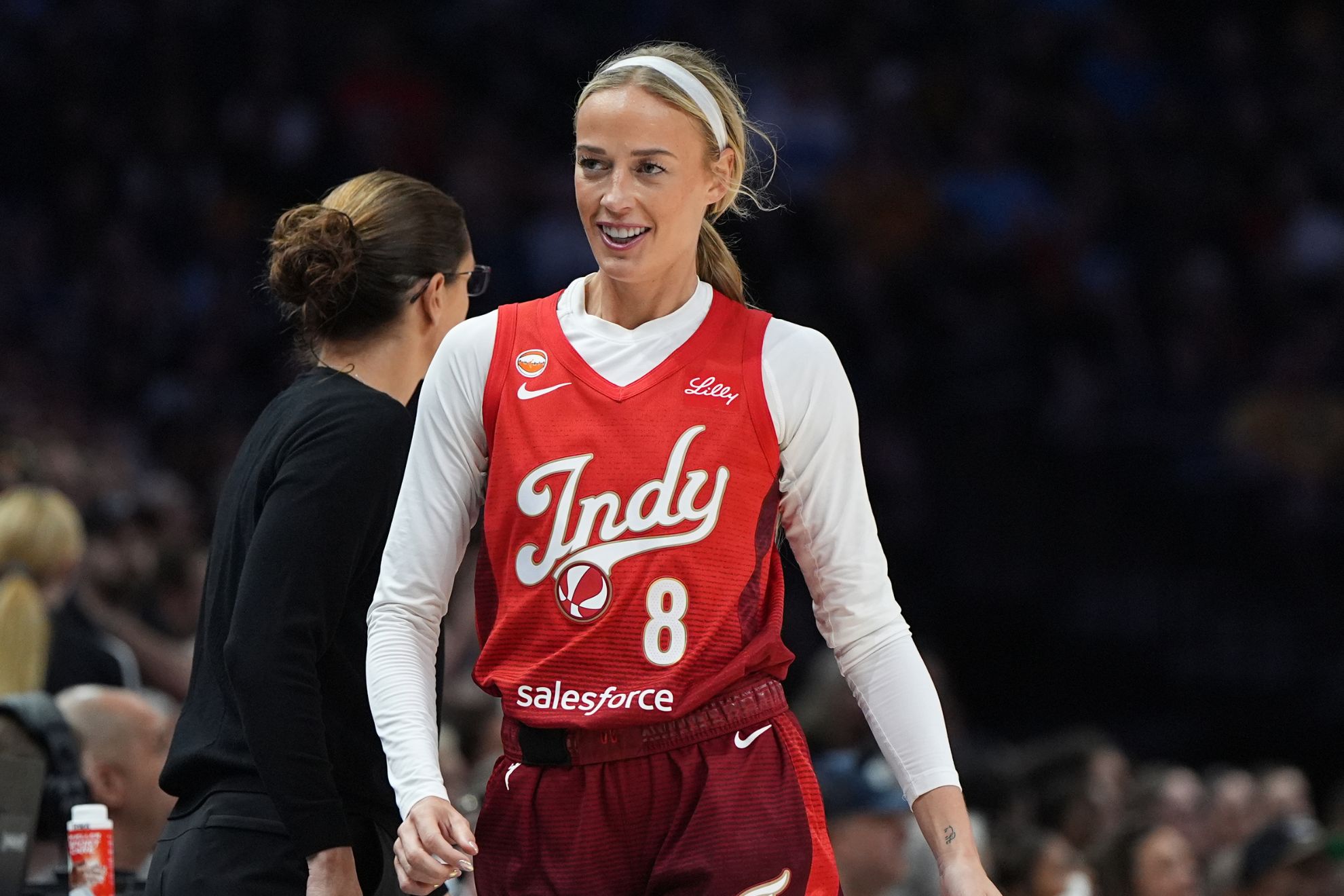 Indiana Fever guard Sophie Cunningham (8) walks to the team bench during the first half of a WNBA basketball game against the Minnesota Lynx Sunday, Aug. 2, 2026, in Minneapolis. AP