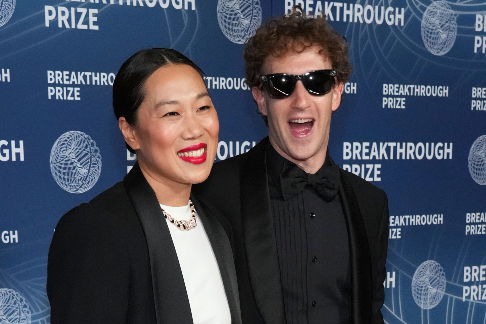 Priscilla Chan, left, and Mark Zuckerberg arrive at the 11th Breakthrough Prize Ceremony