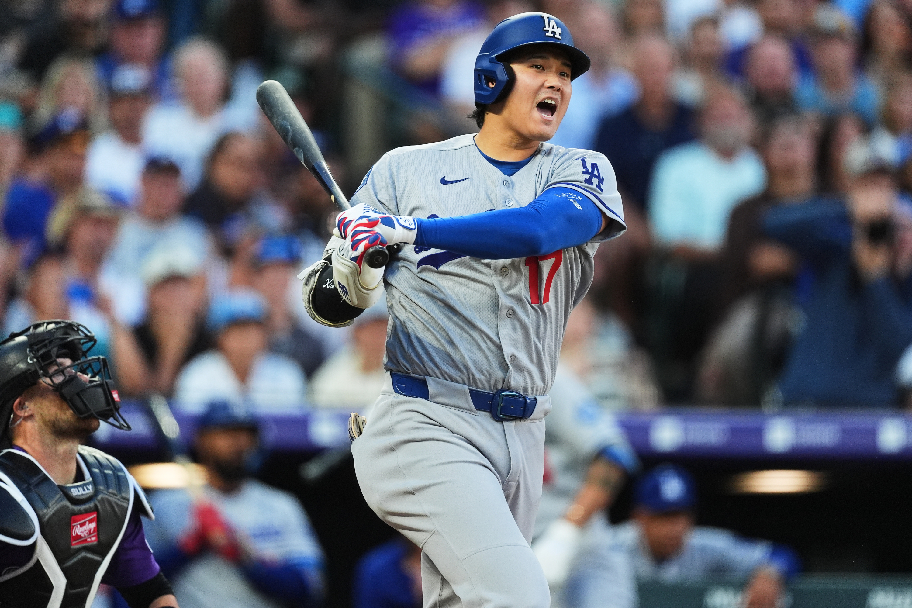 Los Angeles Dodgers' Shohei Ohtani reacts as he fouls off a pitch from Colorado Rockies starting pitcher Kyle Freeland in the third inning of a baseball game Wednesday, Aug. 19, 2026, in Denver. (AP Photo/David Zalubowski) David Zalubowski