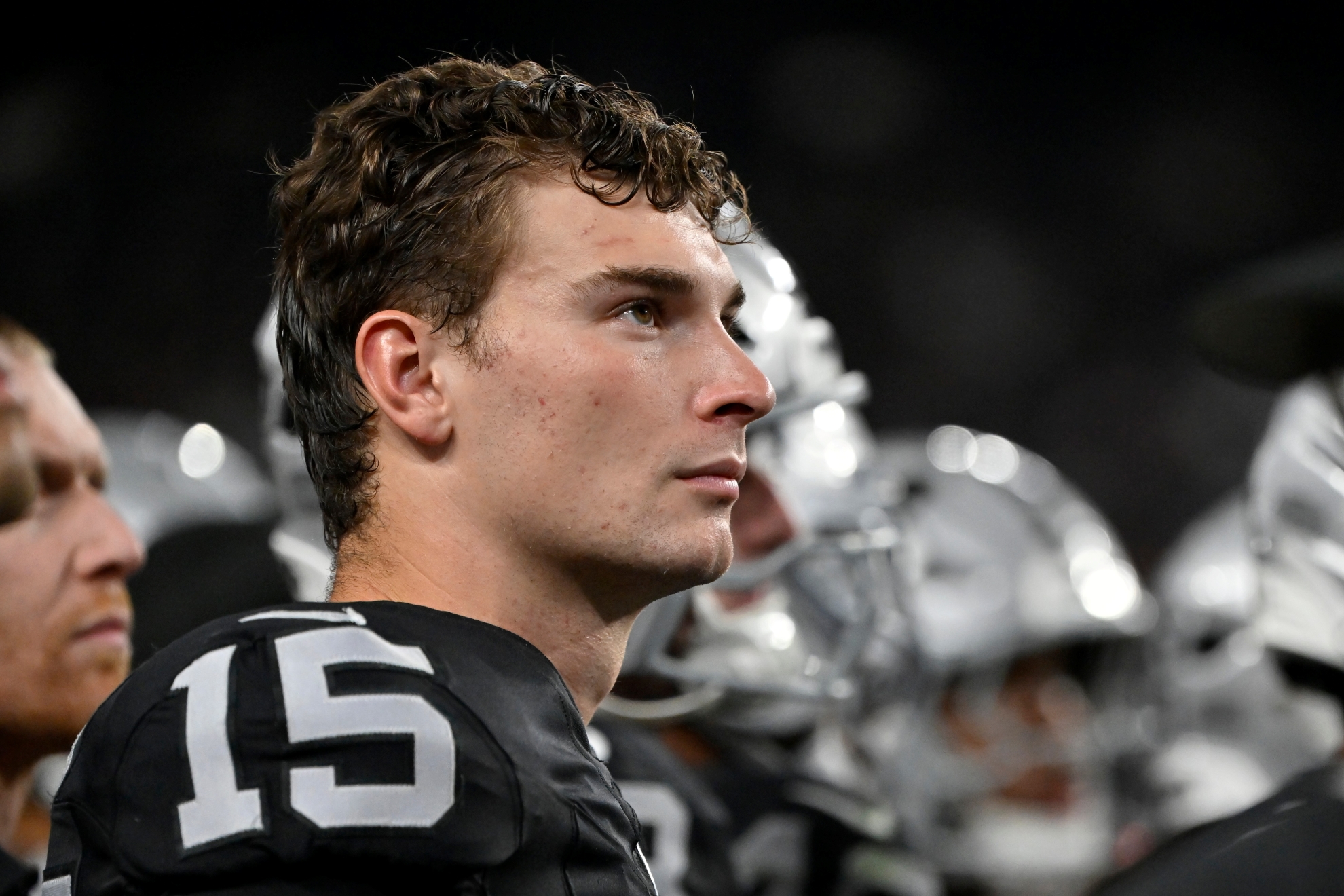 Las Vegas Raiders quarterback Fernando Mendoza pauses on the sideline during a preseason game against the Arizona Cardinals