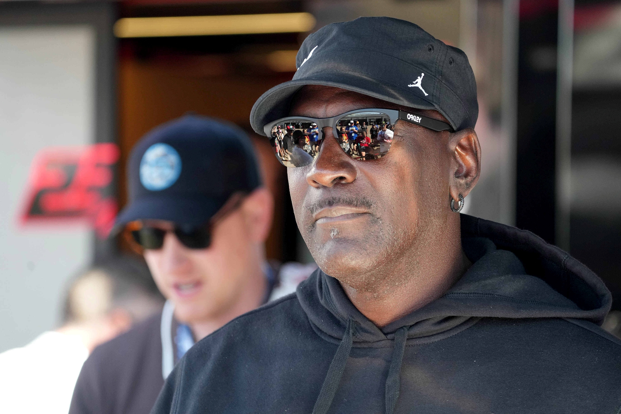 Michael Jordan part owner of 23XI Racing looks on before a NASCAR Cup Series auto race at Phoenix Raceway