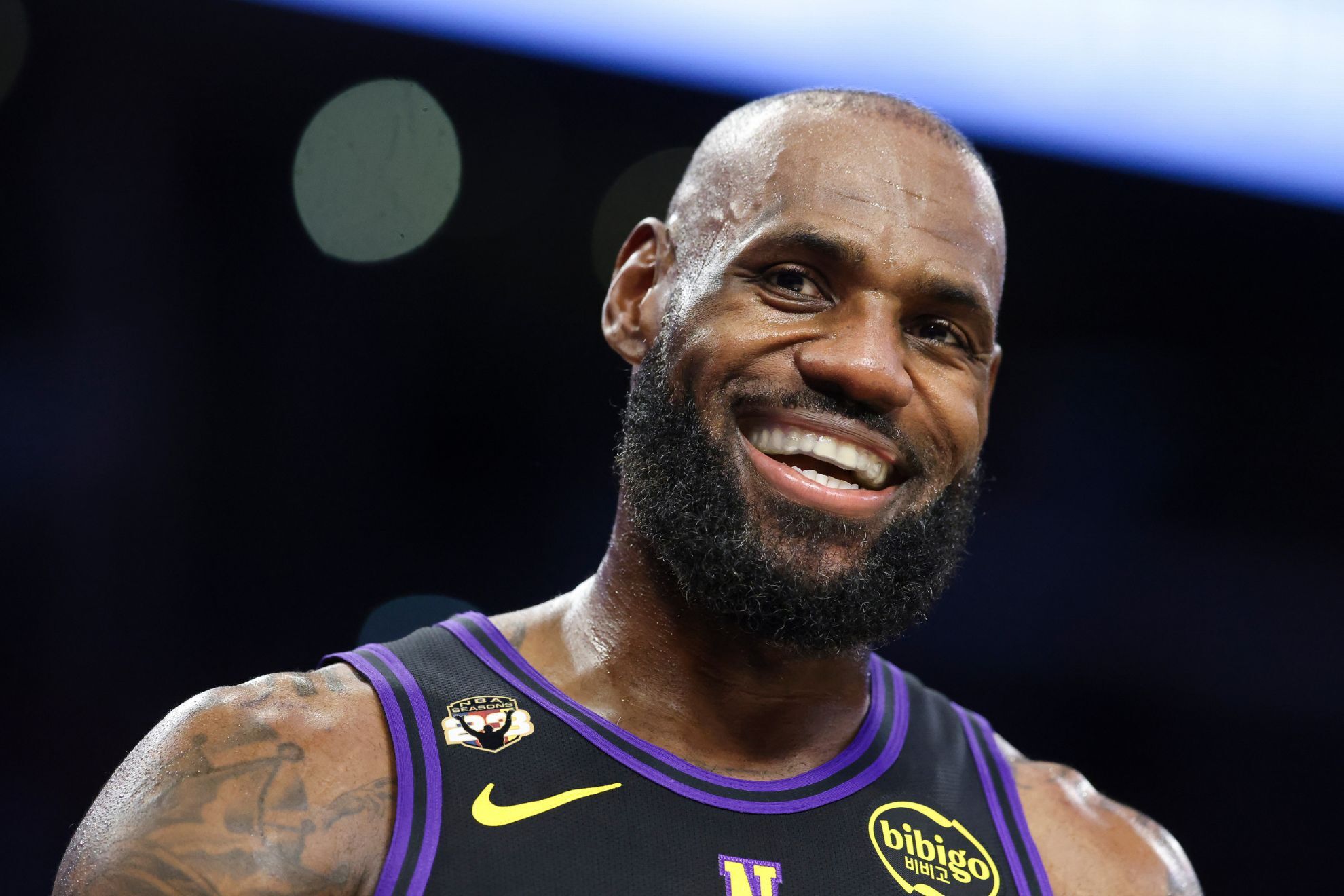 Los Angeles Lakers forward LeBron James reacts during the first half of an NBA basketball game against the Phoenix Suns
