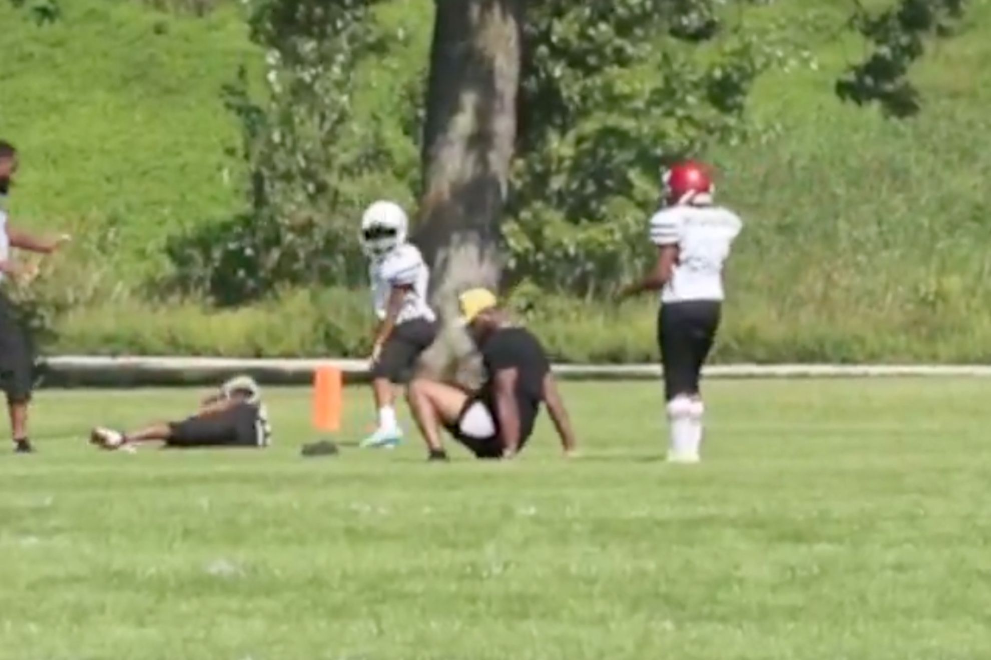 A 41-year-old father runs onto the field and trips a 9-year-old player during a youth football game in Wisconsin