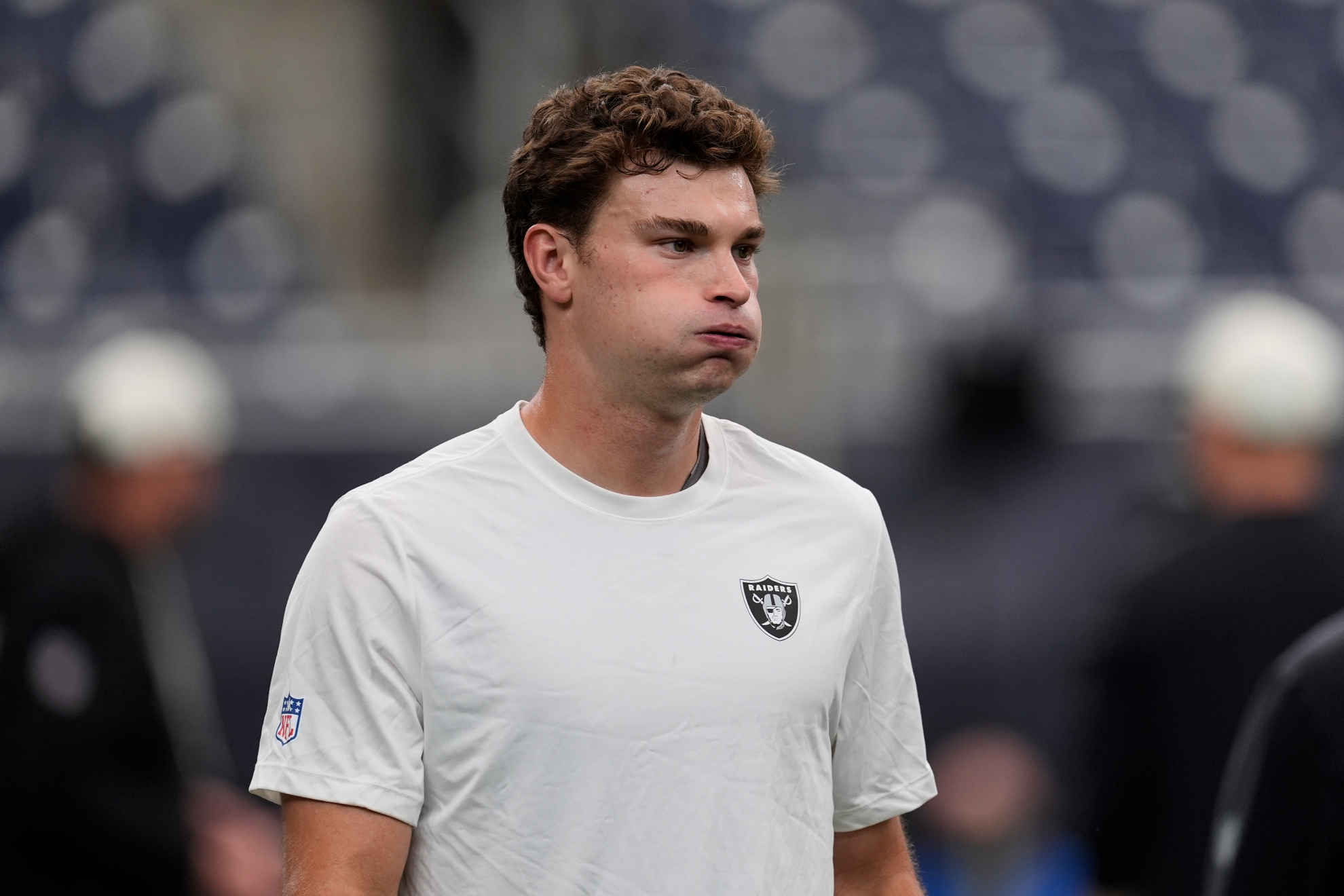Las Vegas Raiders quarterback Fernando Mendoza warms up before an NFL preseason football game against the Houston Texans