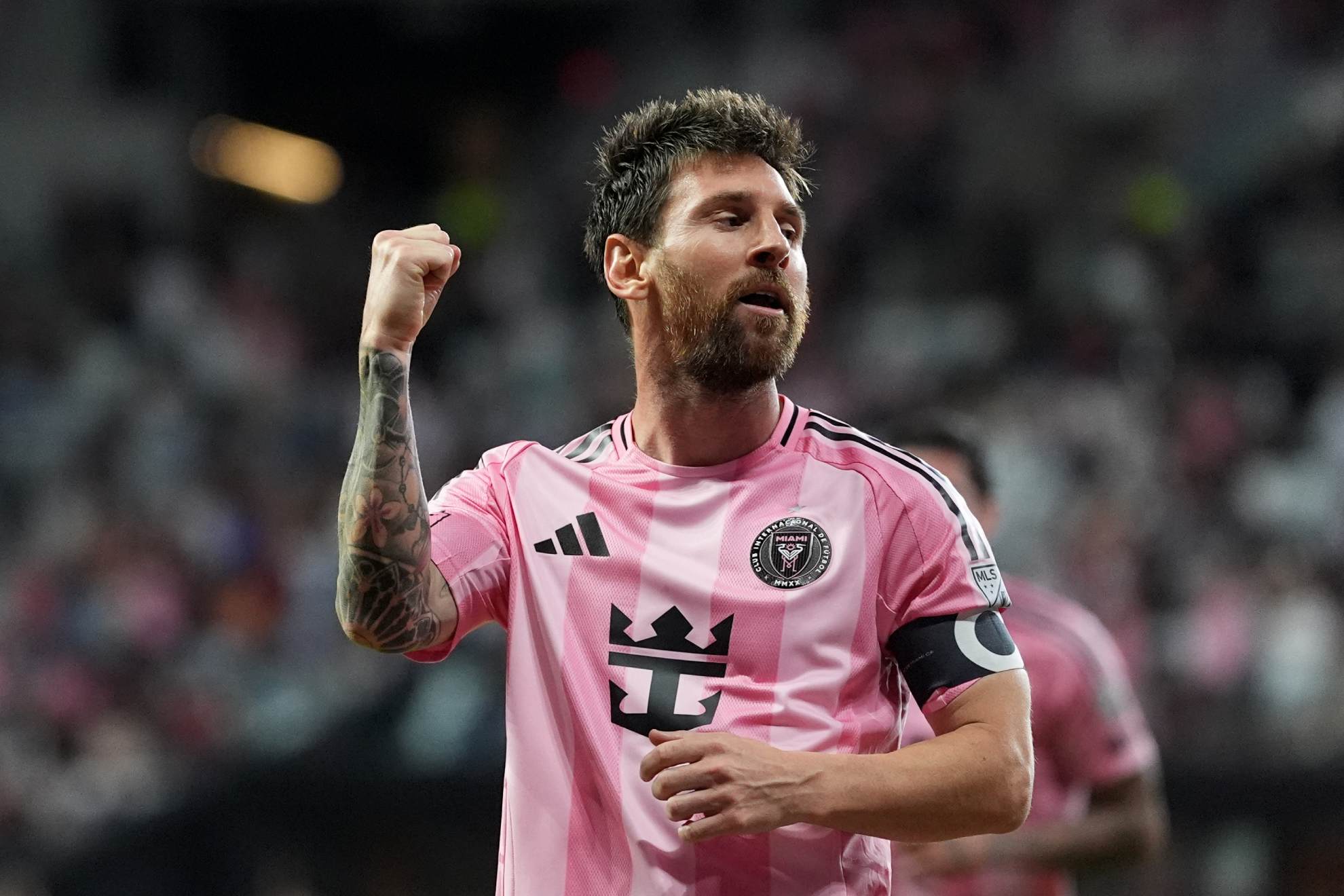 Inter Miami forward Lionel Messi celebrates after scoring his side's third goal during the second half of an MLS soccer match against CF Montreal.