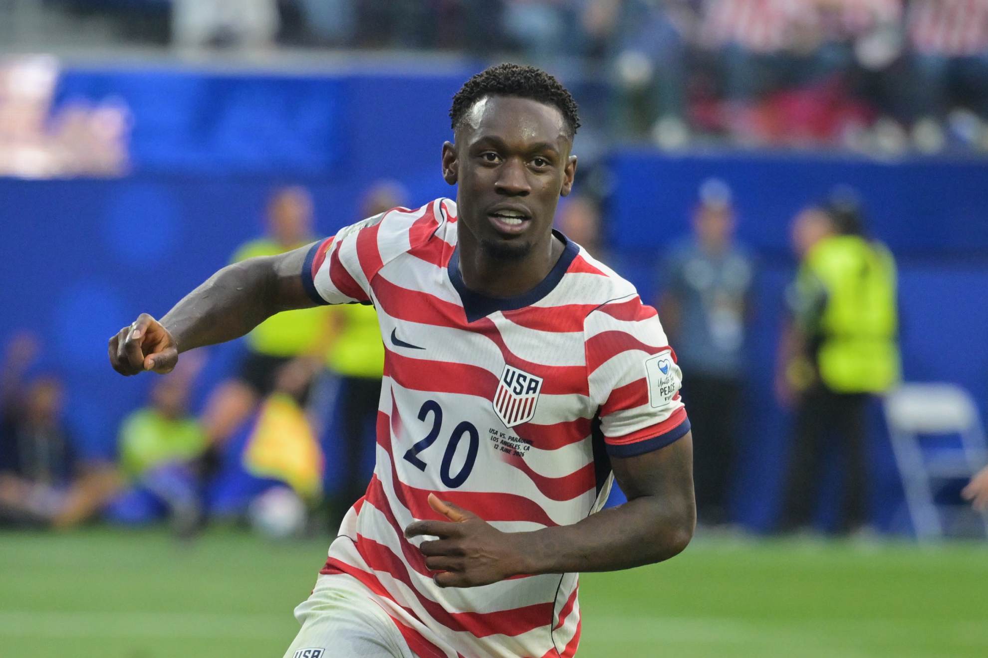 United States' Folarin Balogun (20) celebrates during the World Cup Group D soccer match between the United States and Paraguay in Inglewood, California. Jayne Kamin-Oncea