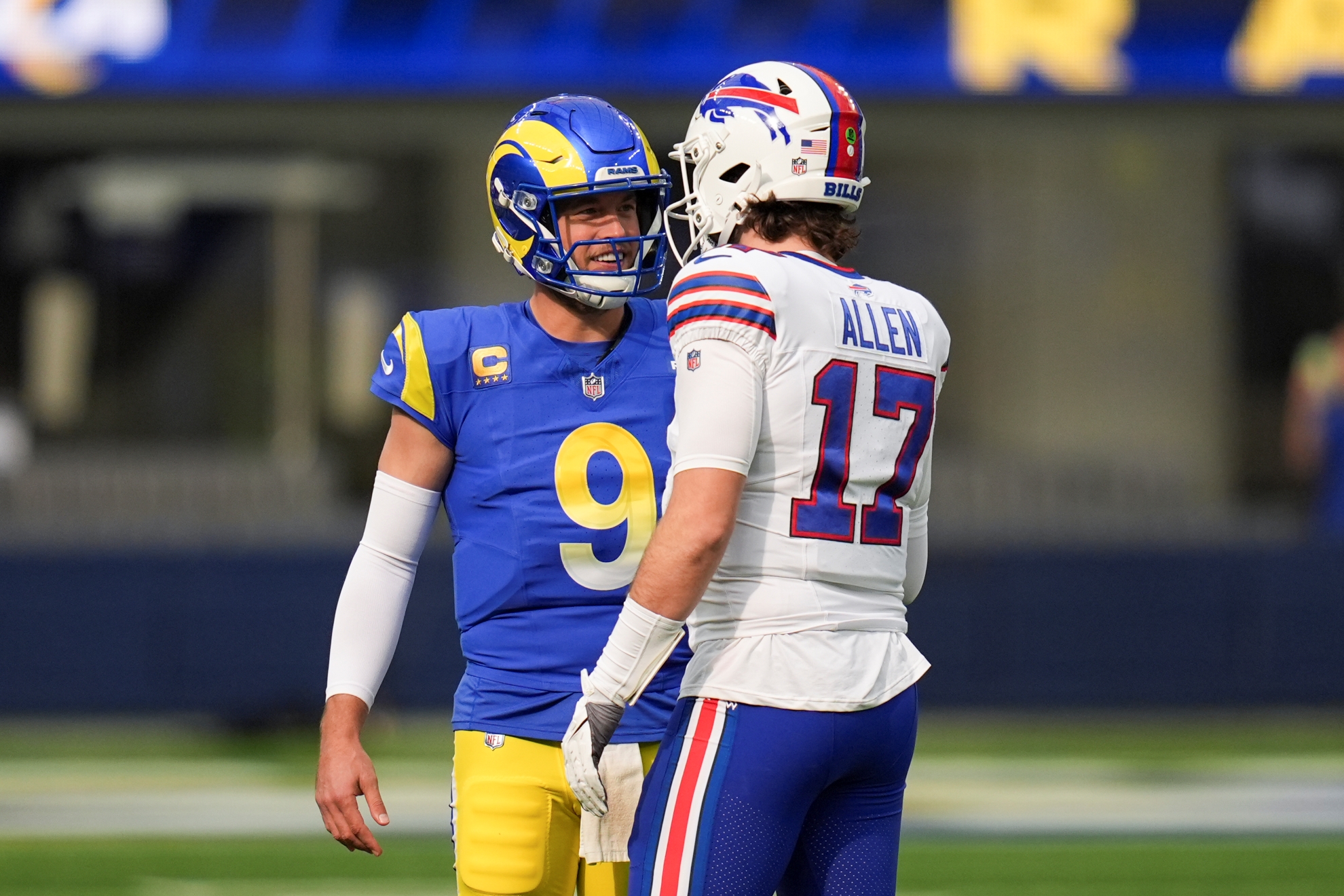 Los Angeles Rams quarterback Matthew Stafford (9) and Buffalo Bills quarterback Josh Allen (17) chat prior to an NFL football game