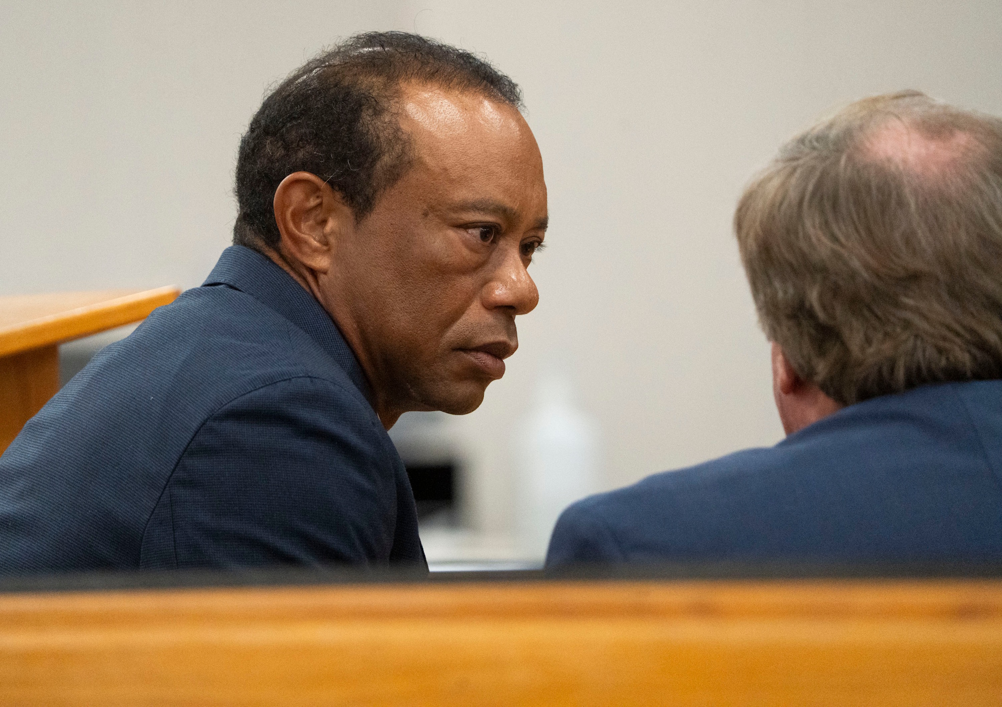 Tiger Woods appears in County Judge Darren Steele's courtroom for a plea hearing from an arrest in March. LAPRESSE