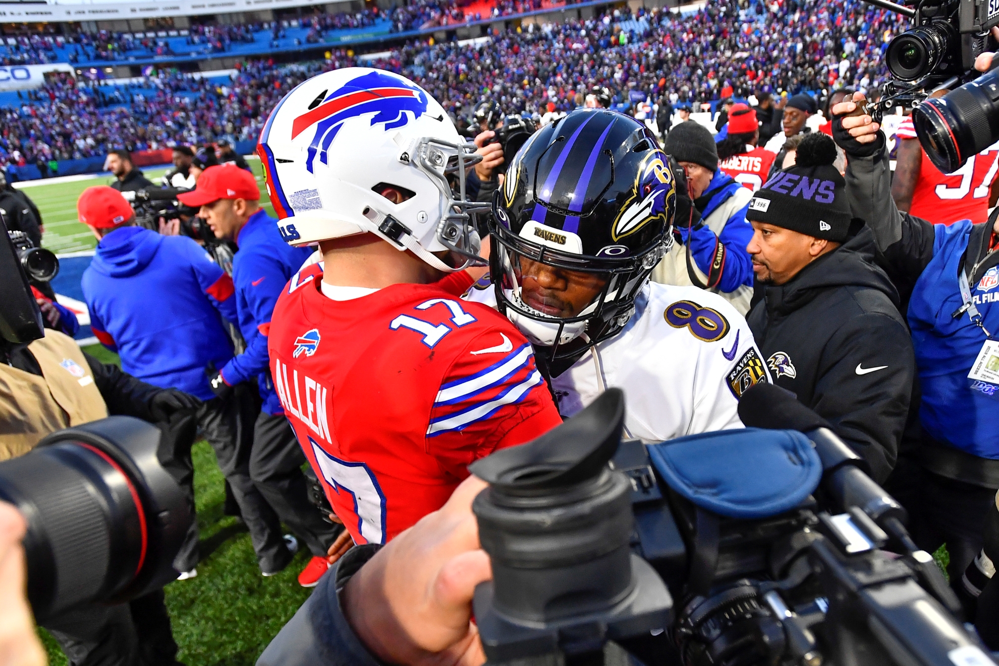 Baltimore Ravens quarterback Lamar Jackson (8) talks with Buffalo Bills quarterback Josh Allen (17) following an NFL football game in Orchard Park