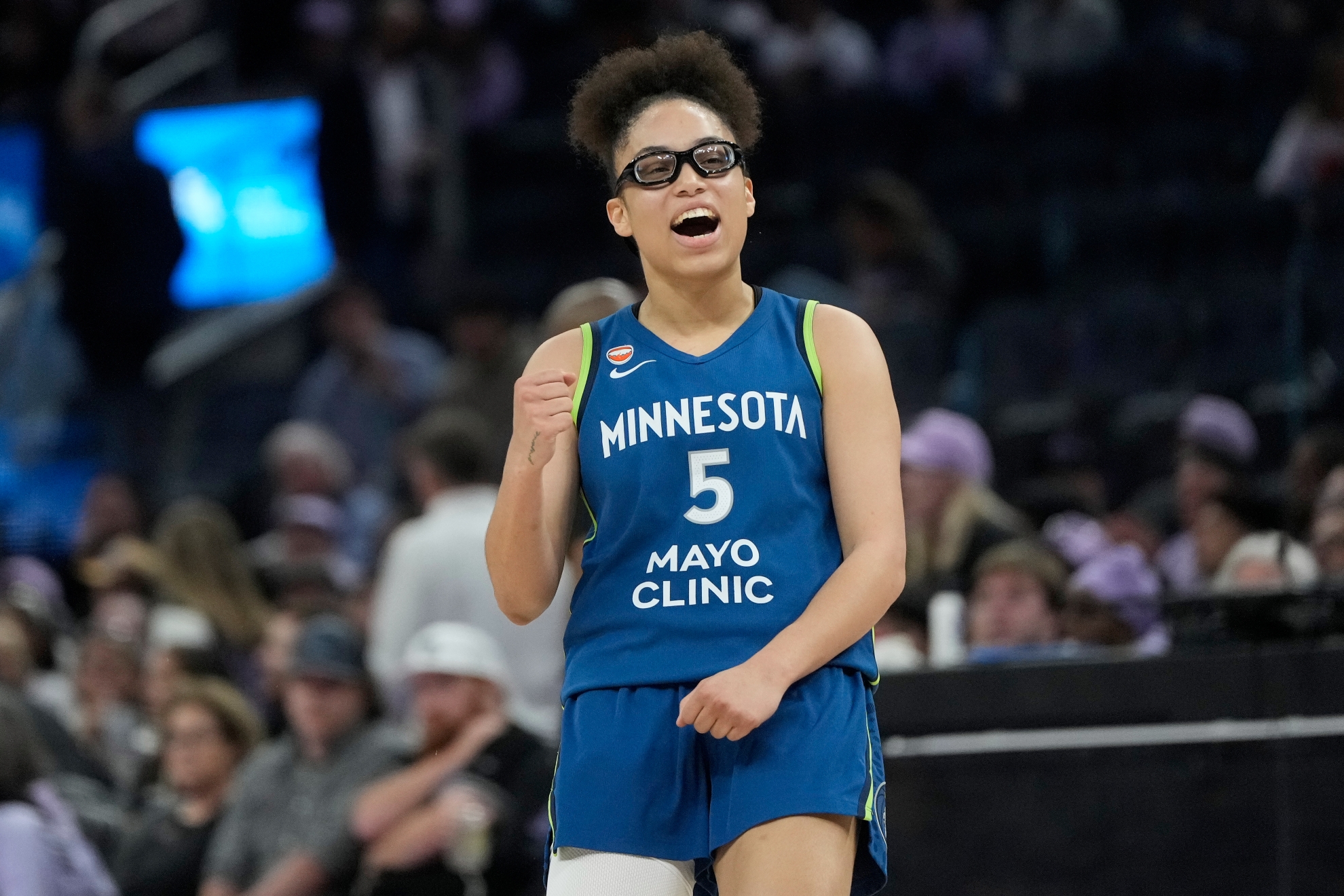 Minnesota Lynx guard Olivia Miles (5) celebrates after scoring against the Golden State Valkyries
