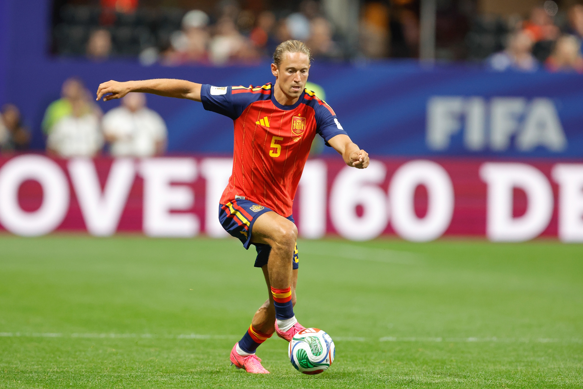 Spain's Marcos Llorente dribbles the ball during a World Cup soccer match.