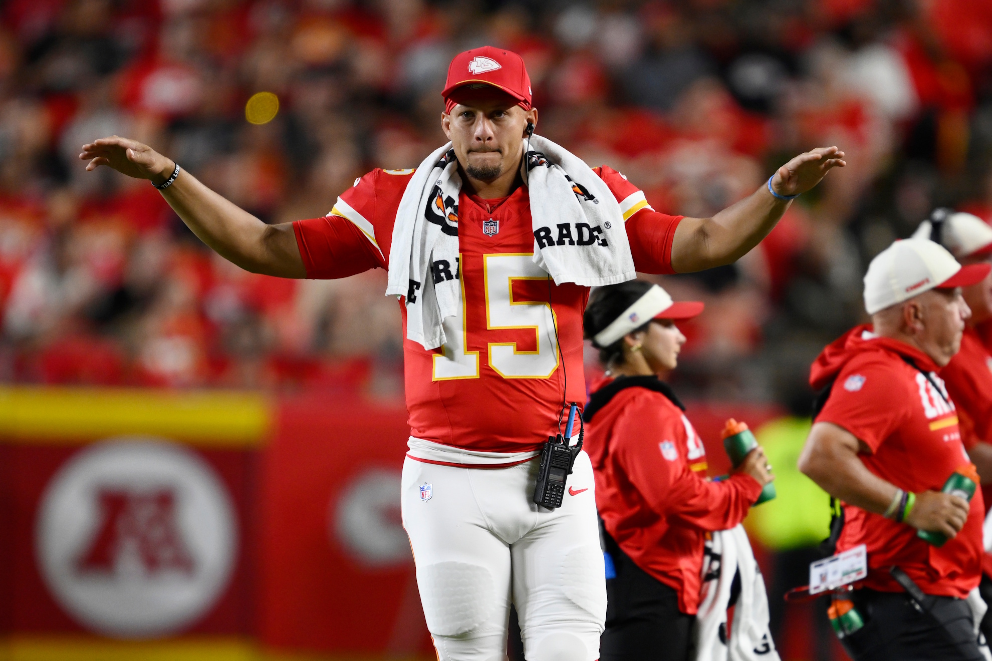 Kansas City Chiefs quarterback Patrick Mahomes (15) motions to teammates during the second half of a preseason NFL football game against the Seattle Seahawks, Friday, Aug. 28, 2026, in Kansas City, Mo. (AP Photo/Reed Hoffmann) AP Photo/Reed Hoffmann
