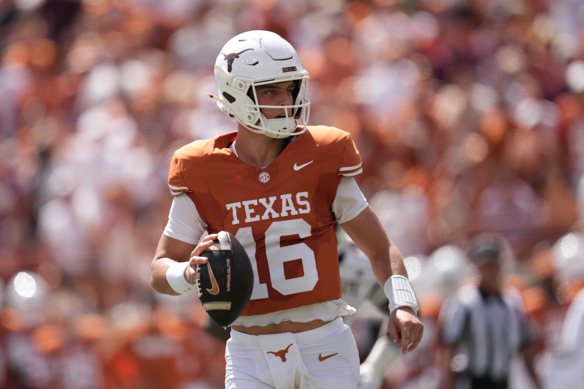 Texas quarterback Arch Manning (16) looks to pass against Texas State during the first half of an NCAA college football game in Austin, Texas