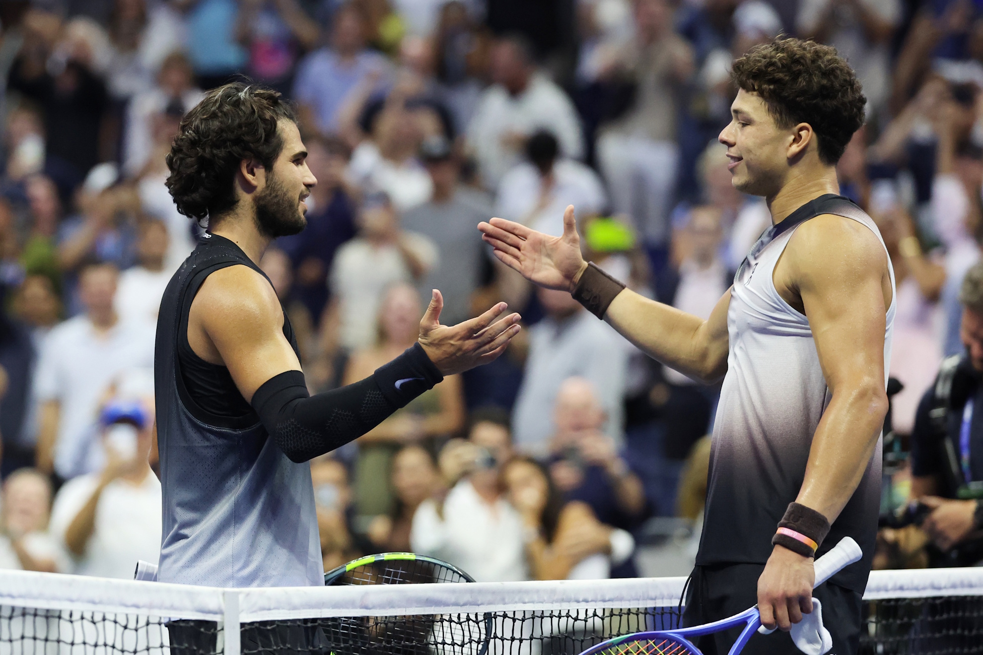 Ben Shelton, right, of the United States, is congratulated by Carlos Alcaraz, of Spain.