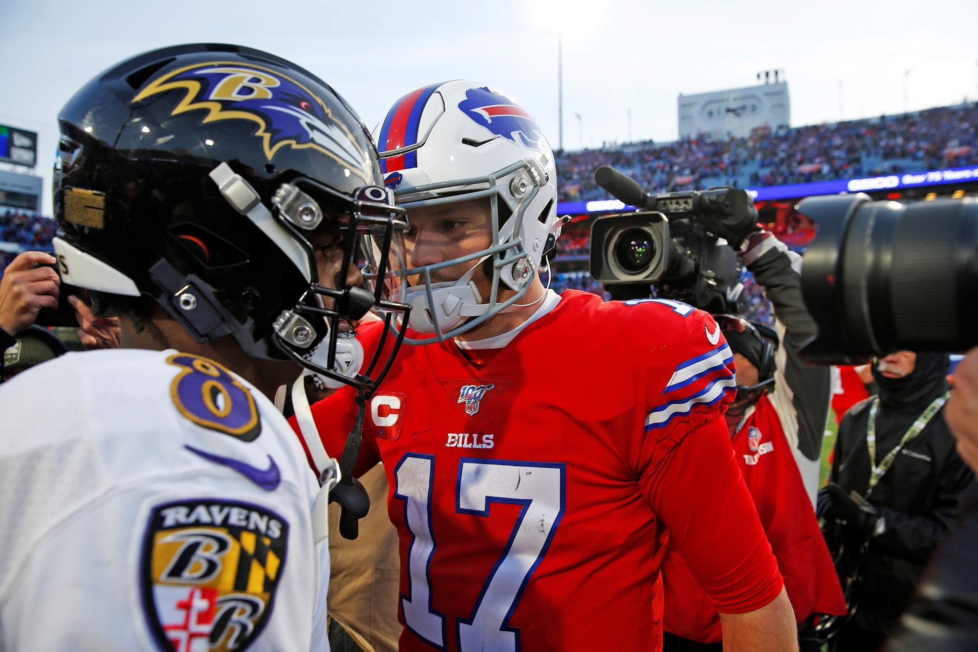 Buffalo Bills quarterback Josh Allen (17) talks with Baltimore Ravens quarterback Lamar Jackson (8)