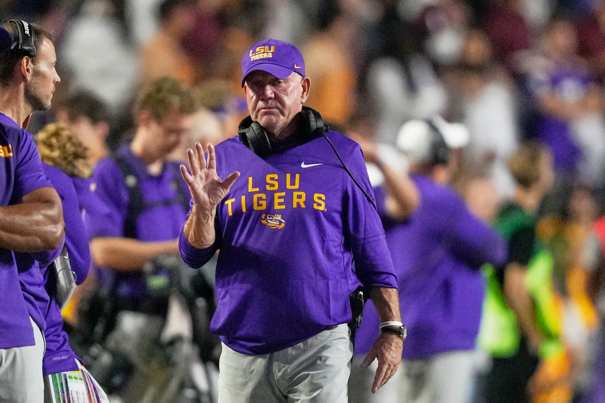 LSU head coach Brian Kelly walks on the sideline in the second half of an NCAA college football game against Texas A&M