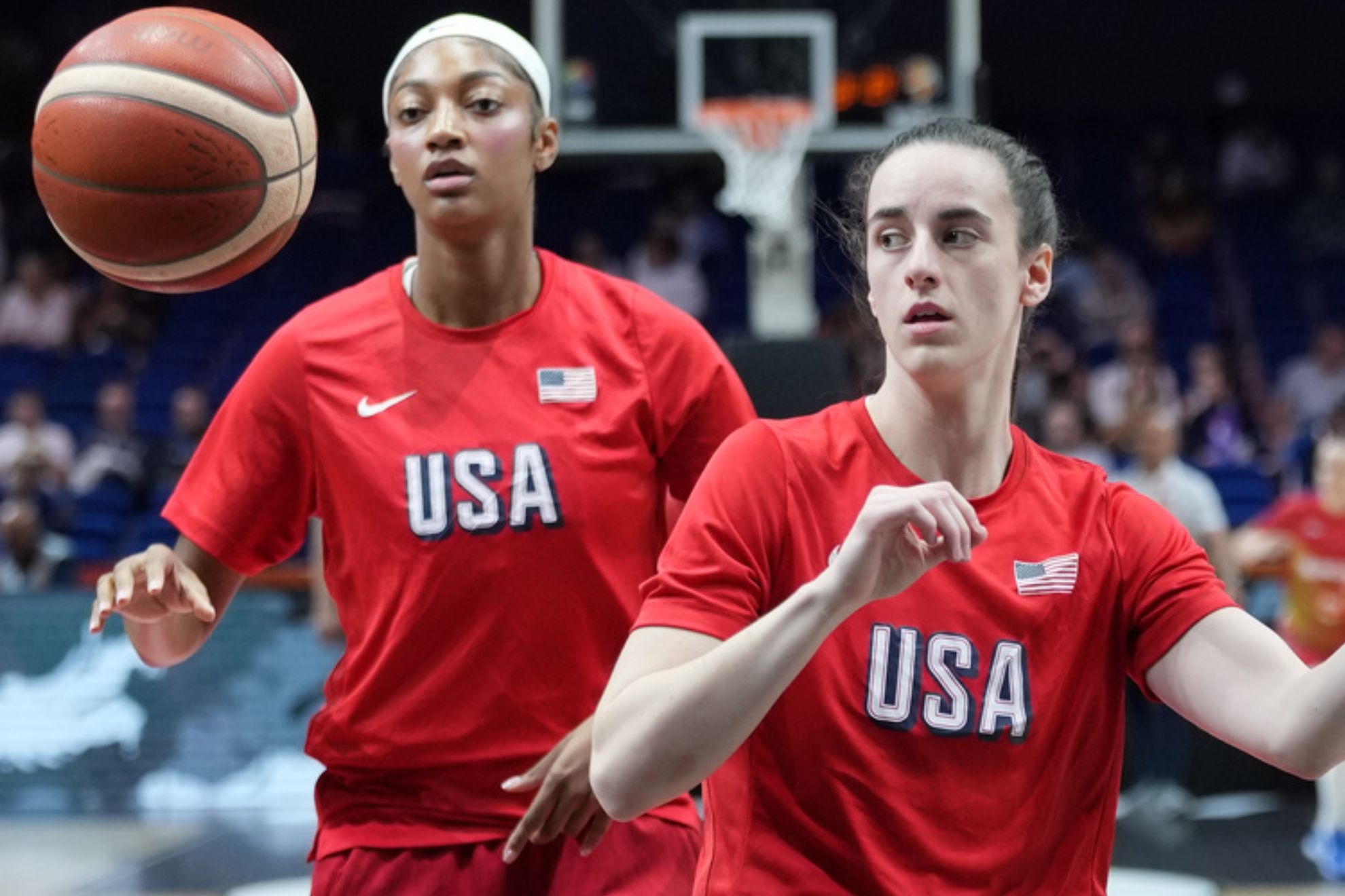 Angel Reese, of the United States, left, and United States' Caitlin Clark