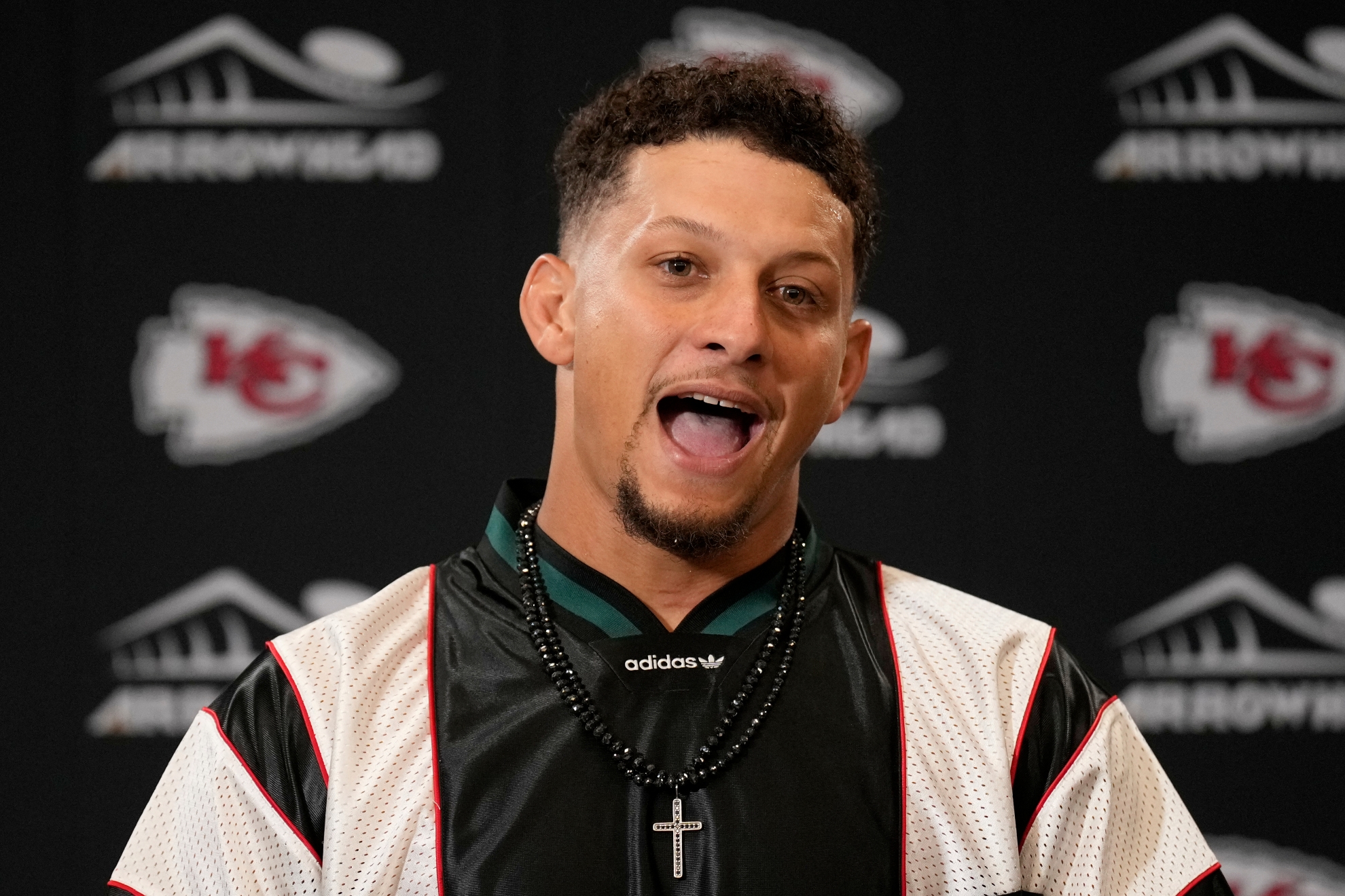 Kansas City Chiefs quarterback Patrick Mahomes speaks to reporters following an NFL football game against the Denver Broncos