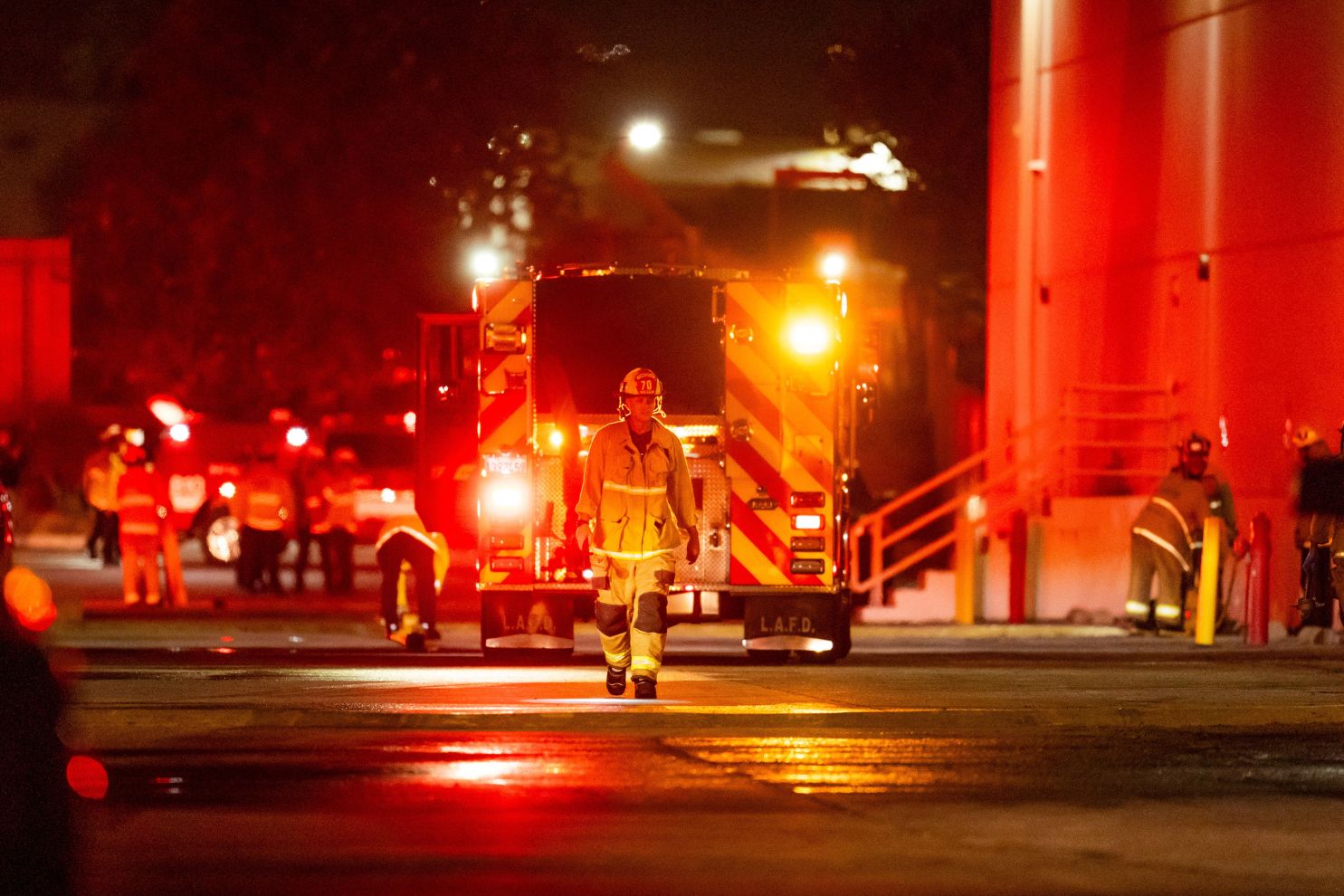 First responders work the scene after a helicopter crashed