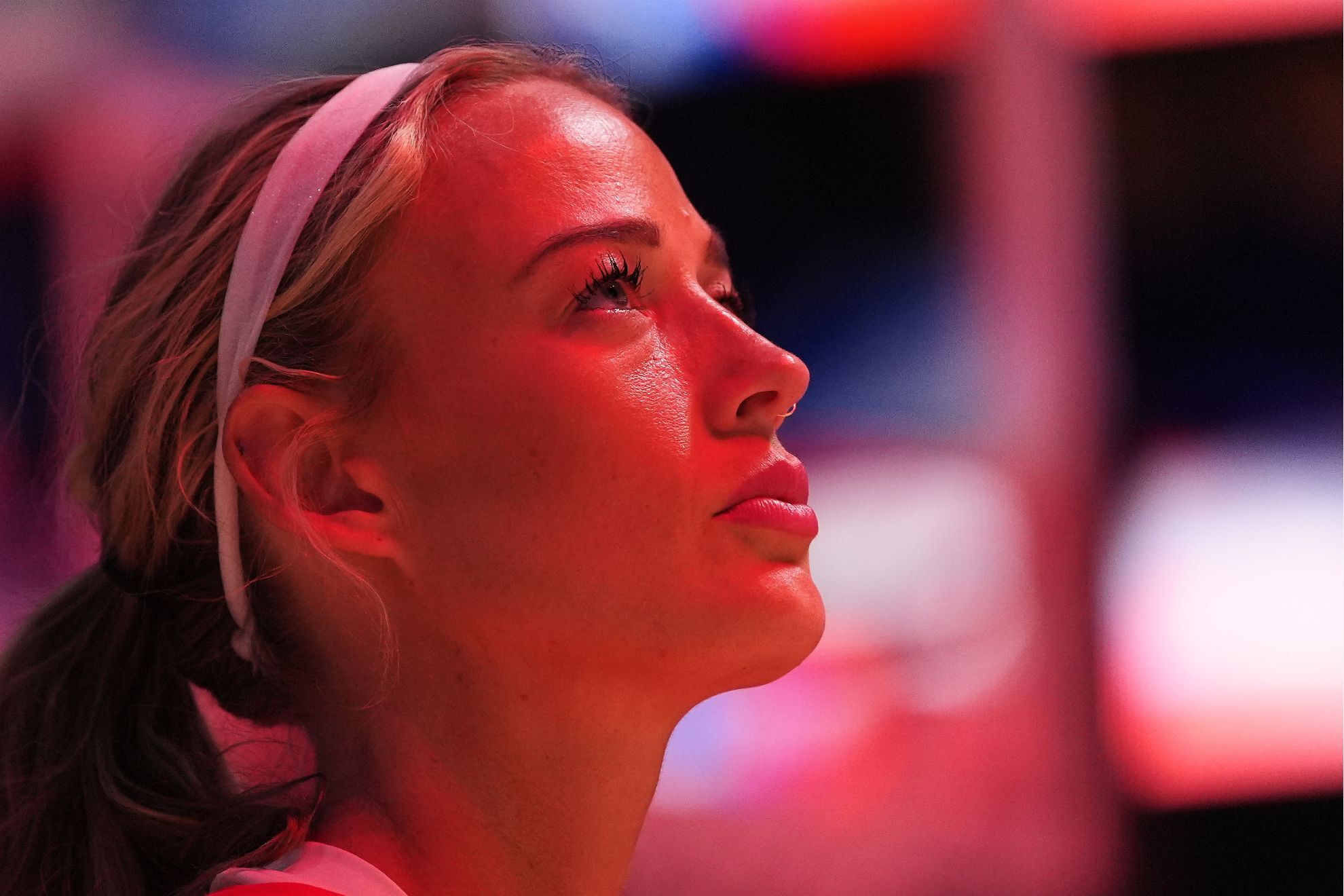 Indiana Fever guard Sophie Cunningham looks on during the national anthem before facing the Seattle Storm a WNBA basketball game