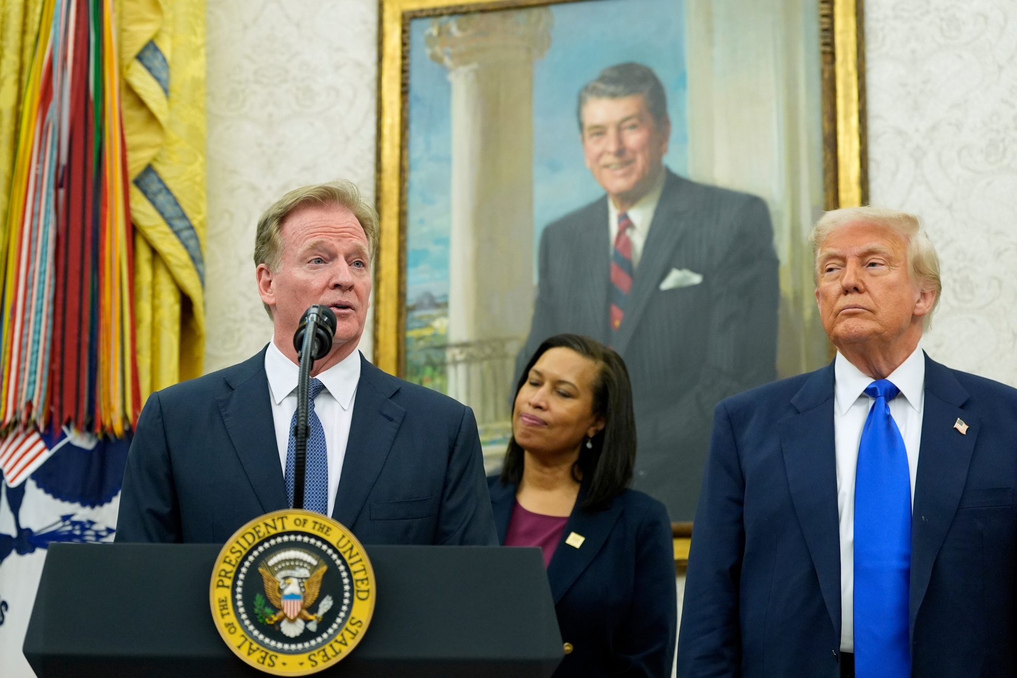 NFL Commissioner Roger Goodell (left) speaks as President Donald Trump listens during an event announcing that the 2027 NFL Draft will be held on the National Mall