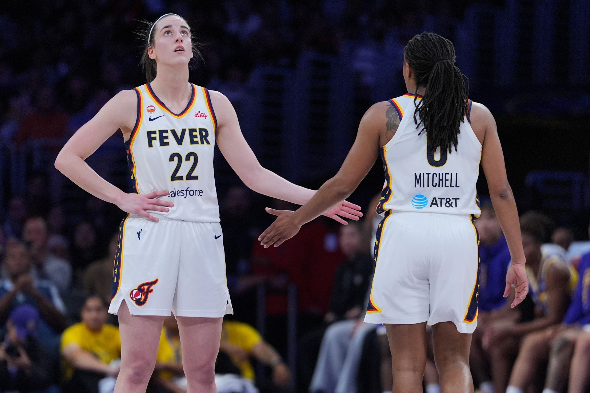 Indiana Fever guard Caitlin Clark (22) and guard Kelsey Mitchell (0)