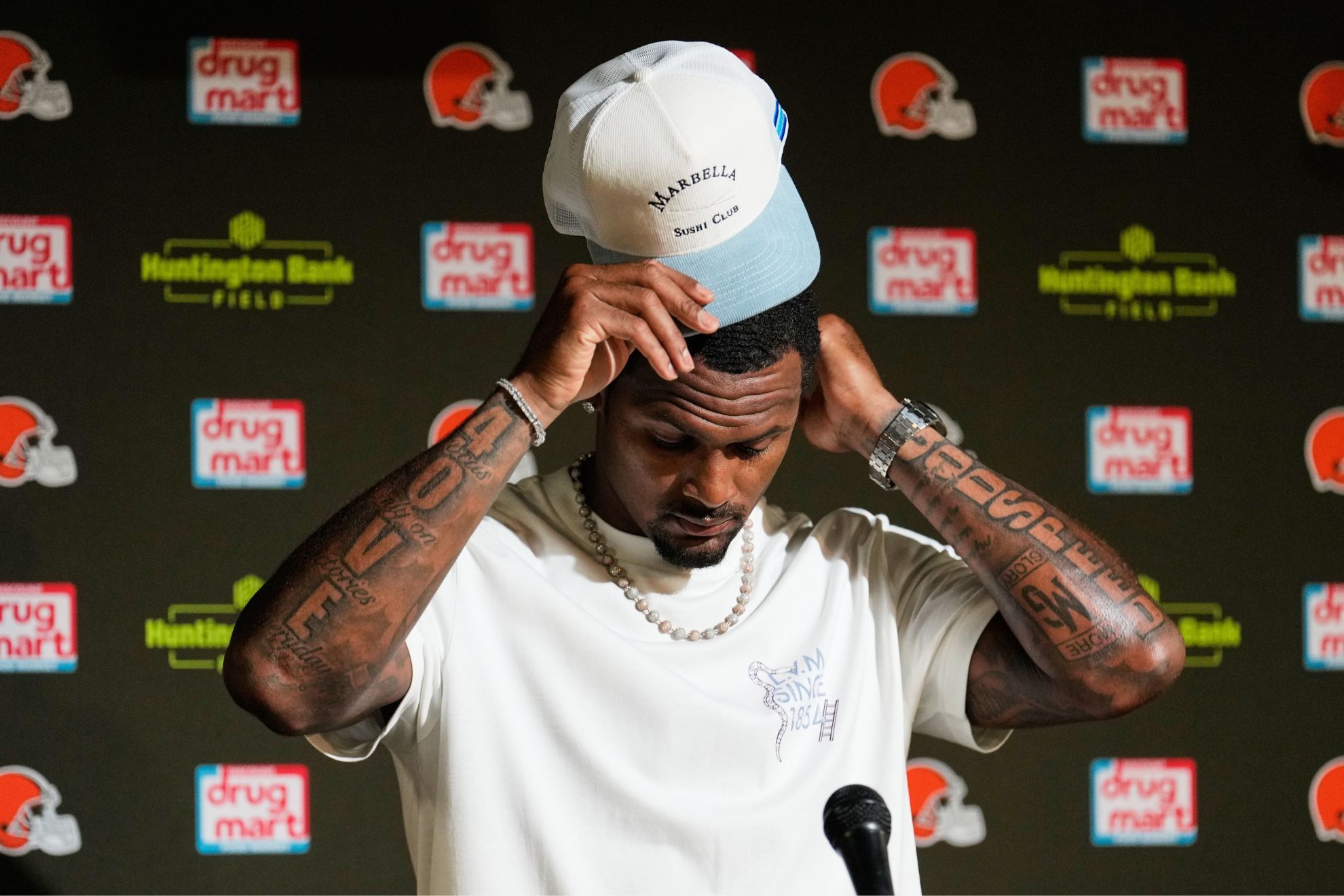 Cleveland Browns quarterback Deshaun Watson speaks at a press conference