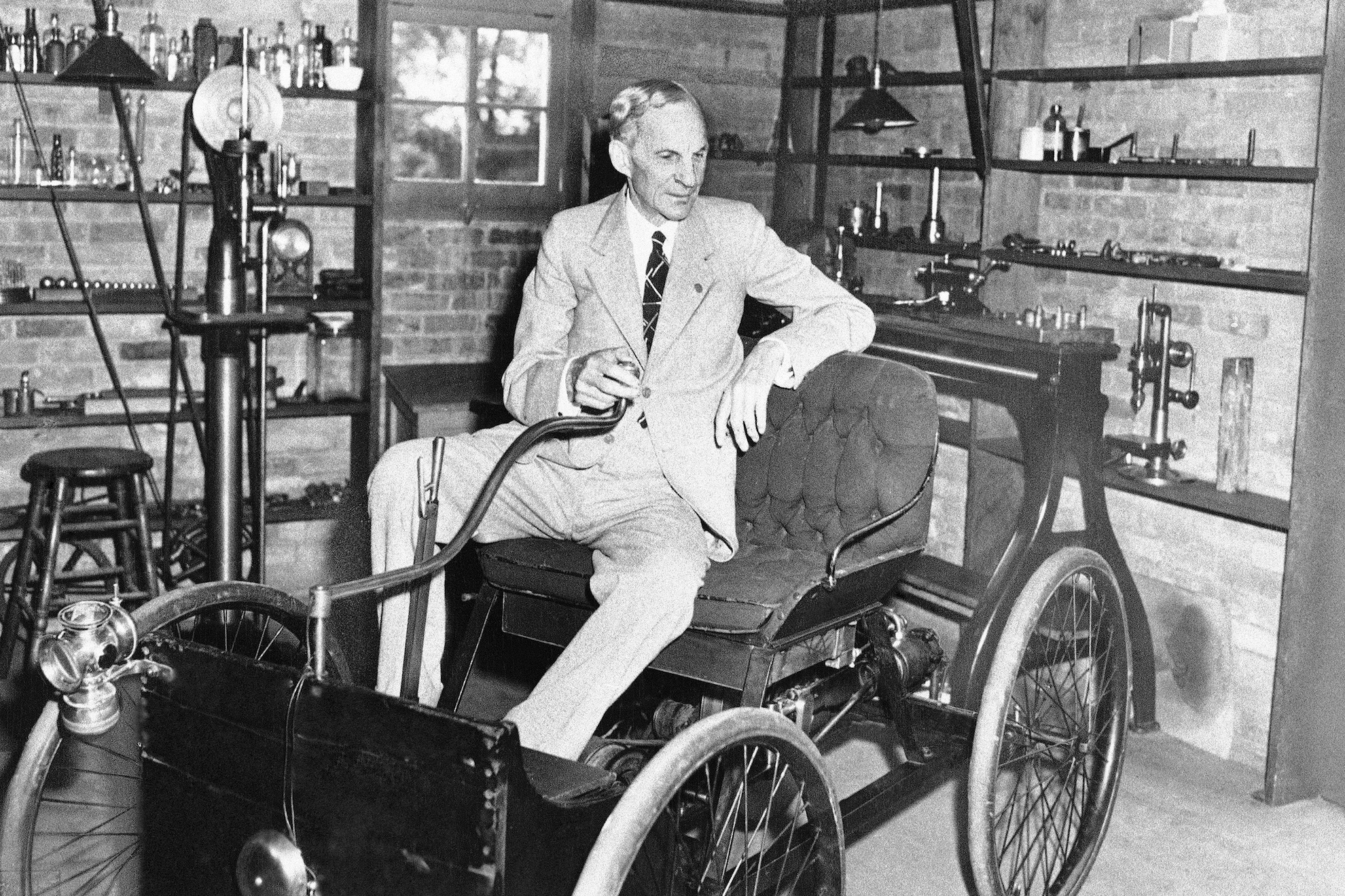 Henry Ford sits in first car he built in his first shop, on his 79th birthday, July 30, 1942 LAPRESSE