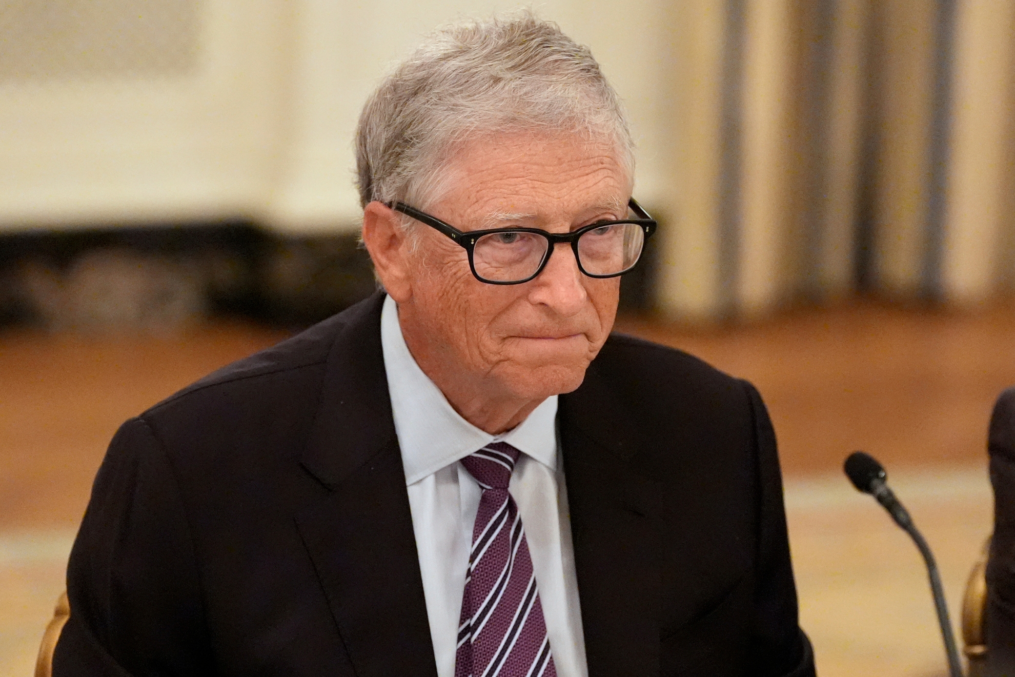Microsoft's Bill Gates attends a dinner with President Donald Trump in the State Dining Room of the White House