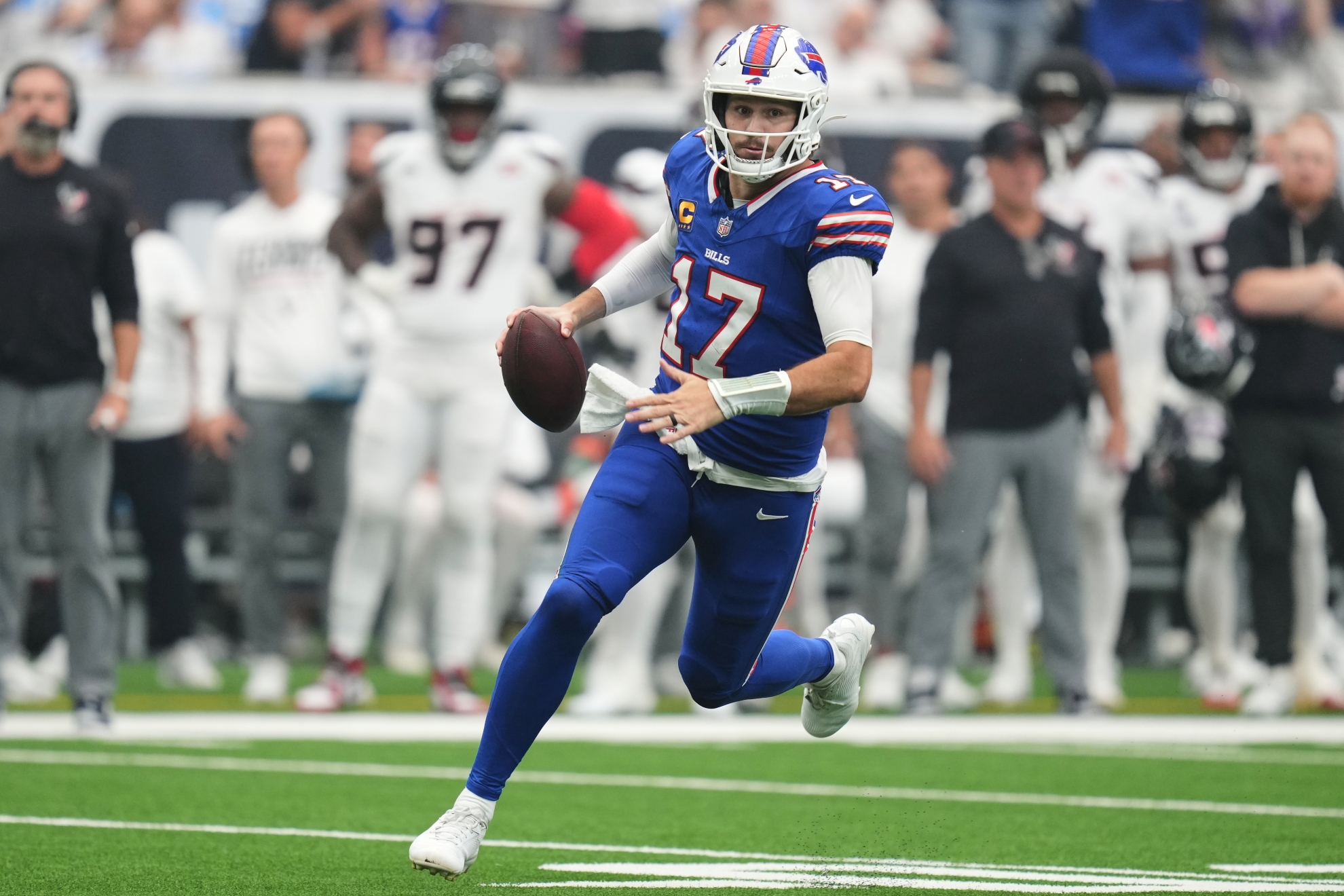 Buffalo Bills quarterback Josh Allen (17) runs the ball against the Houston Texans