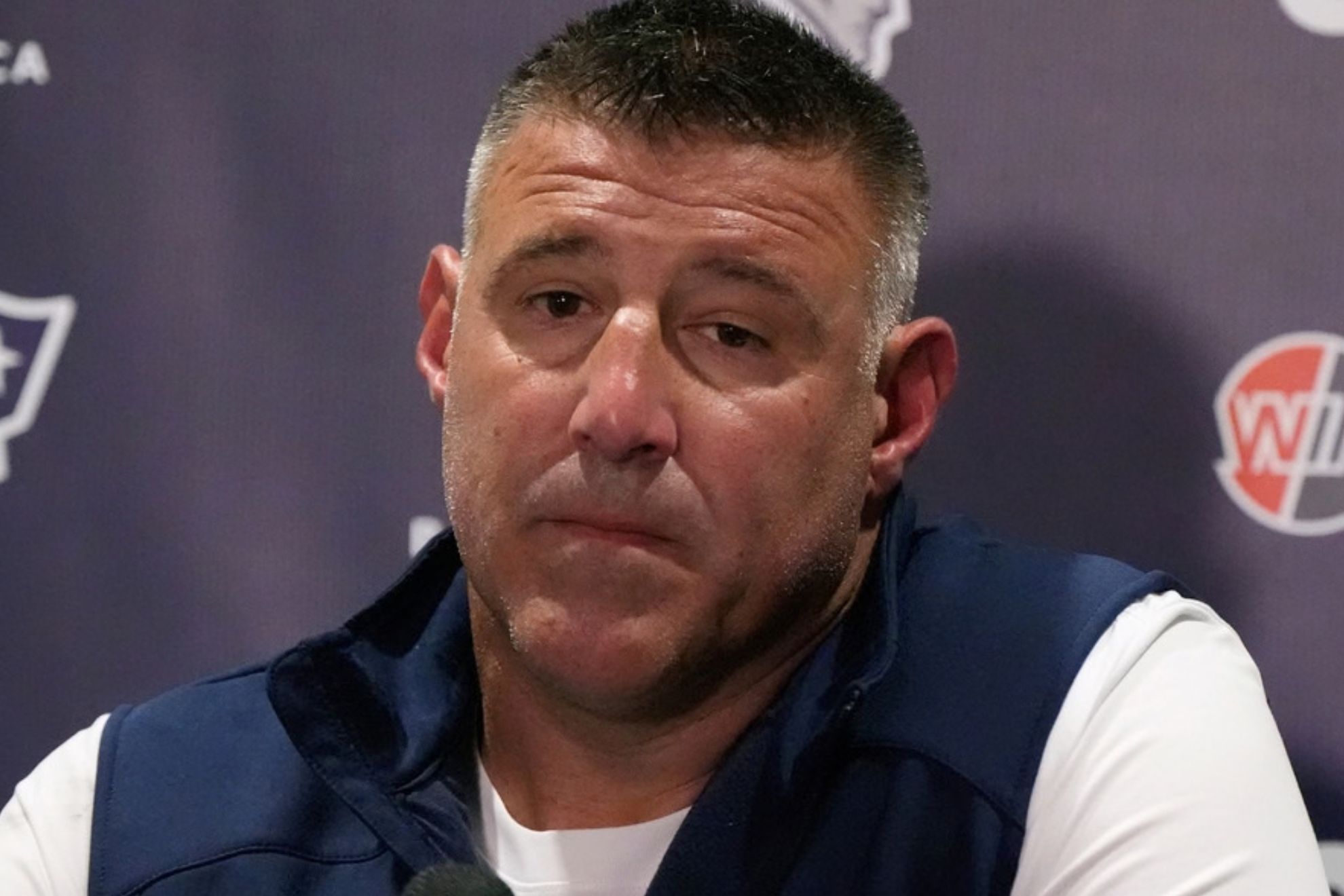 New England Patriots head coach Mike Vrabel speaks in a press conference after an NFL football game against the Jacksonville Jaguars in Jacksonville