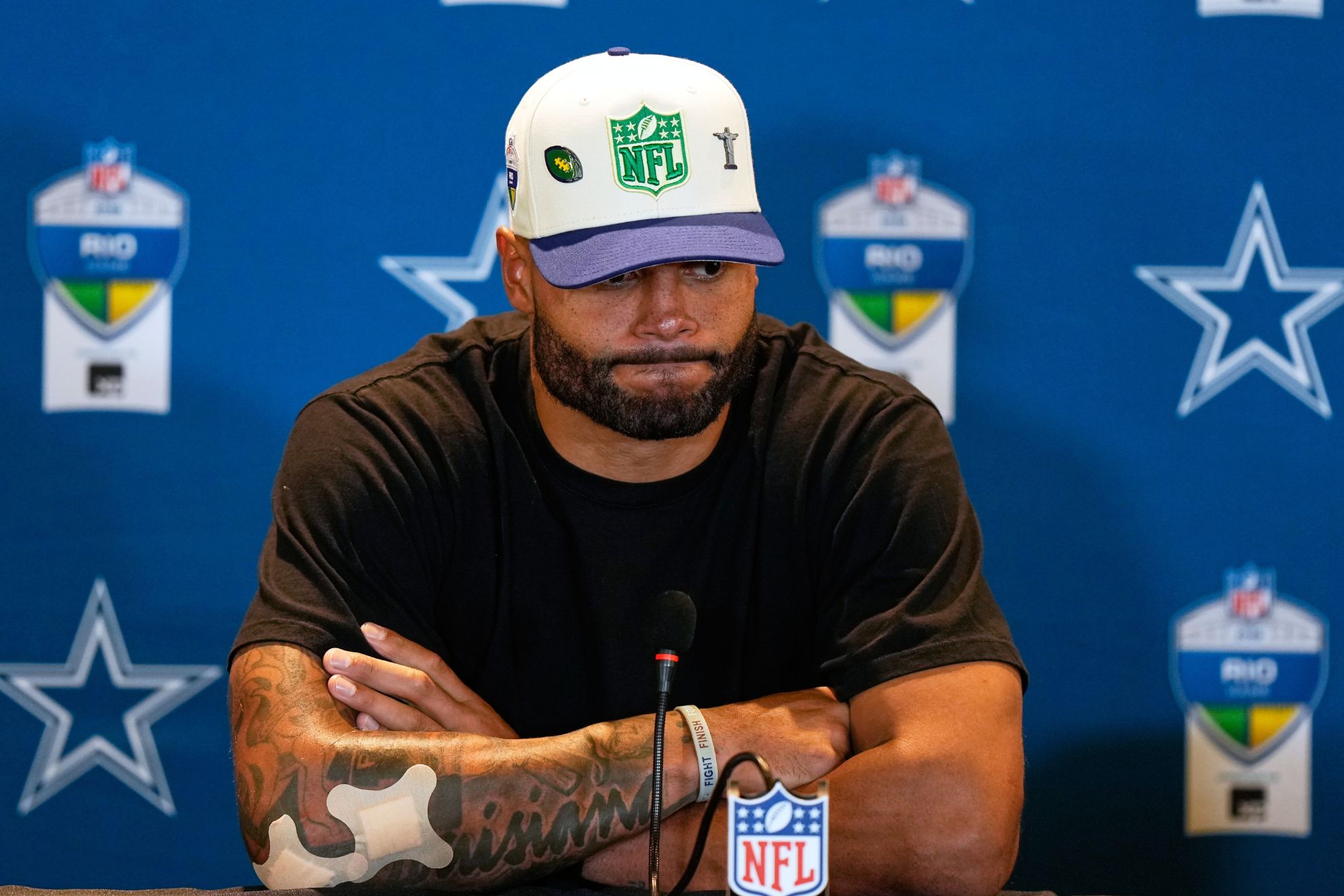 Dallas Cowboys quarterback Dak Prescott speaks during a press conference after an NFL football game against the Baltimore Ravens in Rio de Janeiro