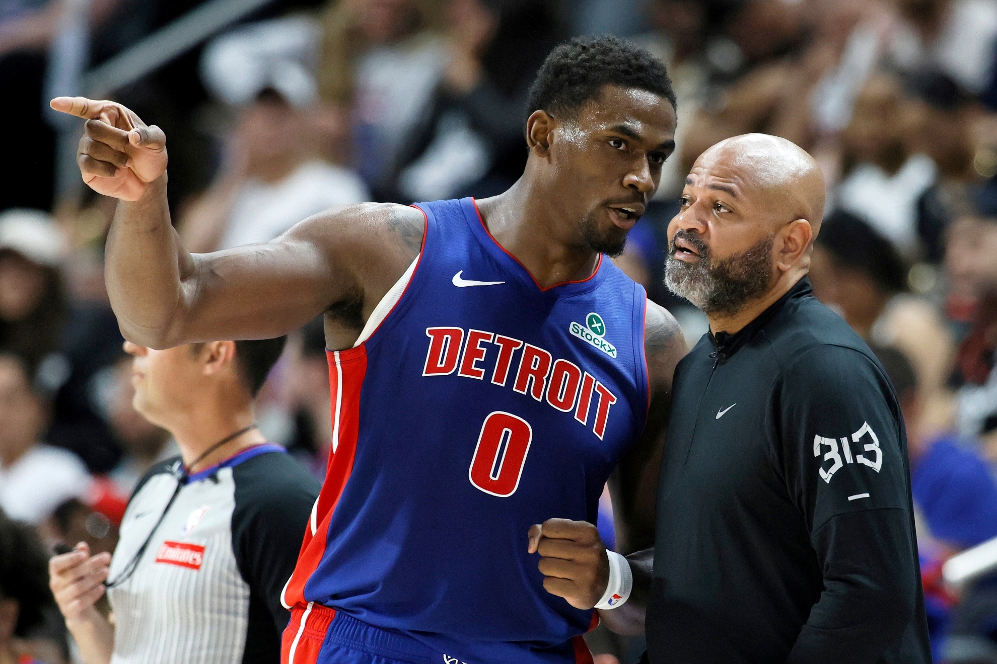 Detroit Pistons center Jalen Duren (0) talks with head coach J.B. Bickerstaff during Game 7 of a second-round NBA playoffs basketball series