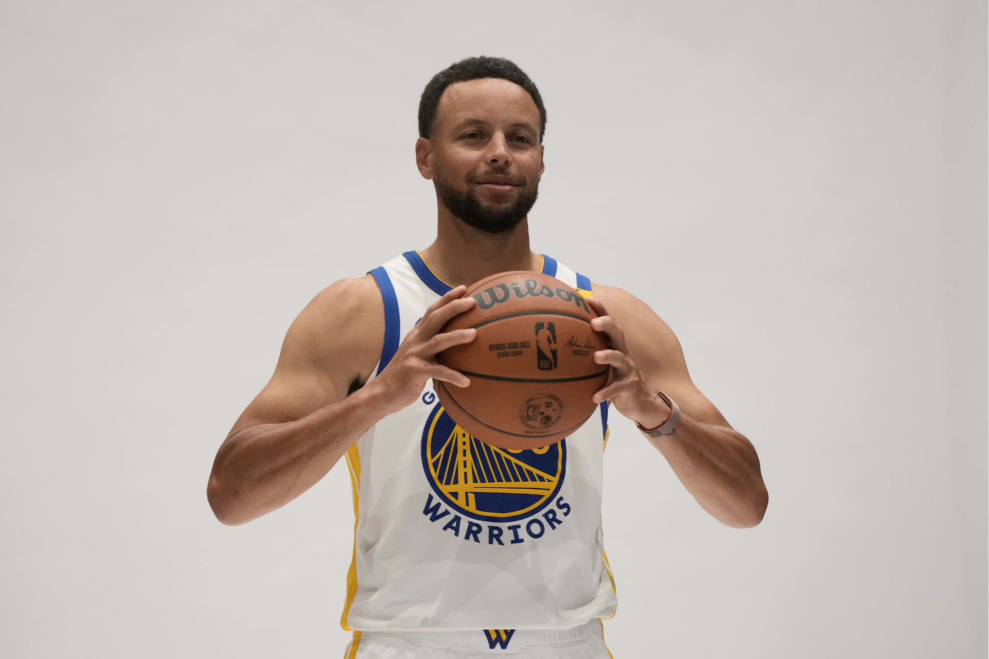 Golden State Warriors guard Stephen Curry poses for photos during the NBA basketball team's media day