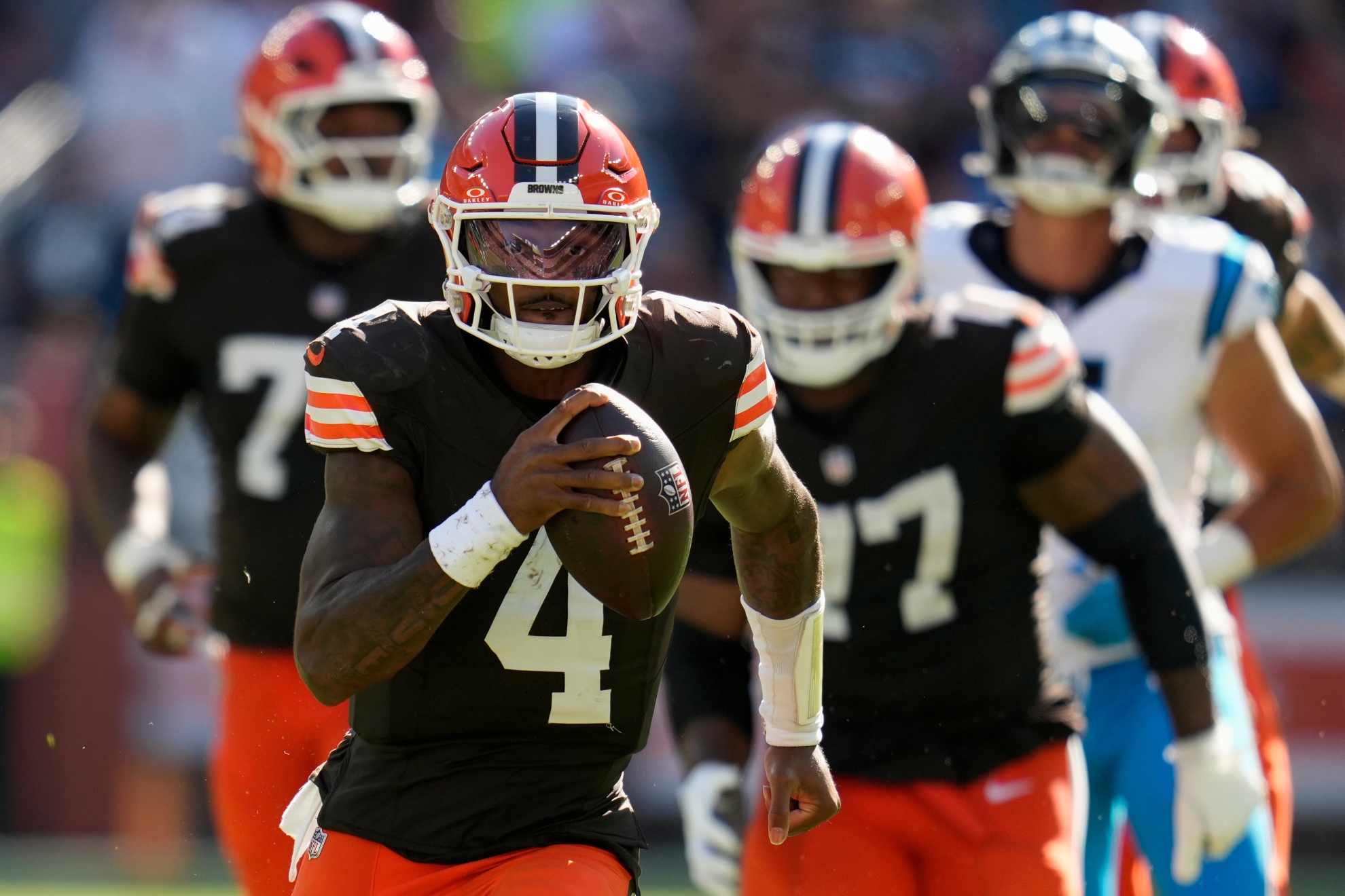 Cleveland Browns quarterback Deshaun Watson (4) runs with the ball against the Carolina Panthers