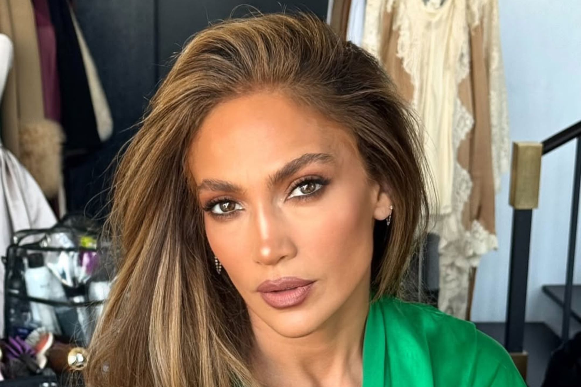 Jennifer Lopez sparks backlash after keeping her umbrella to herself at fashion show