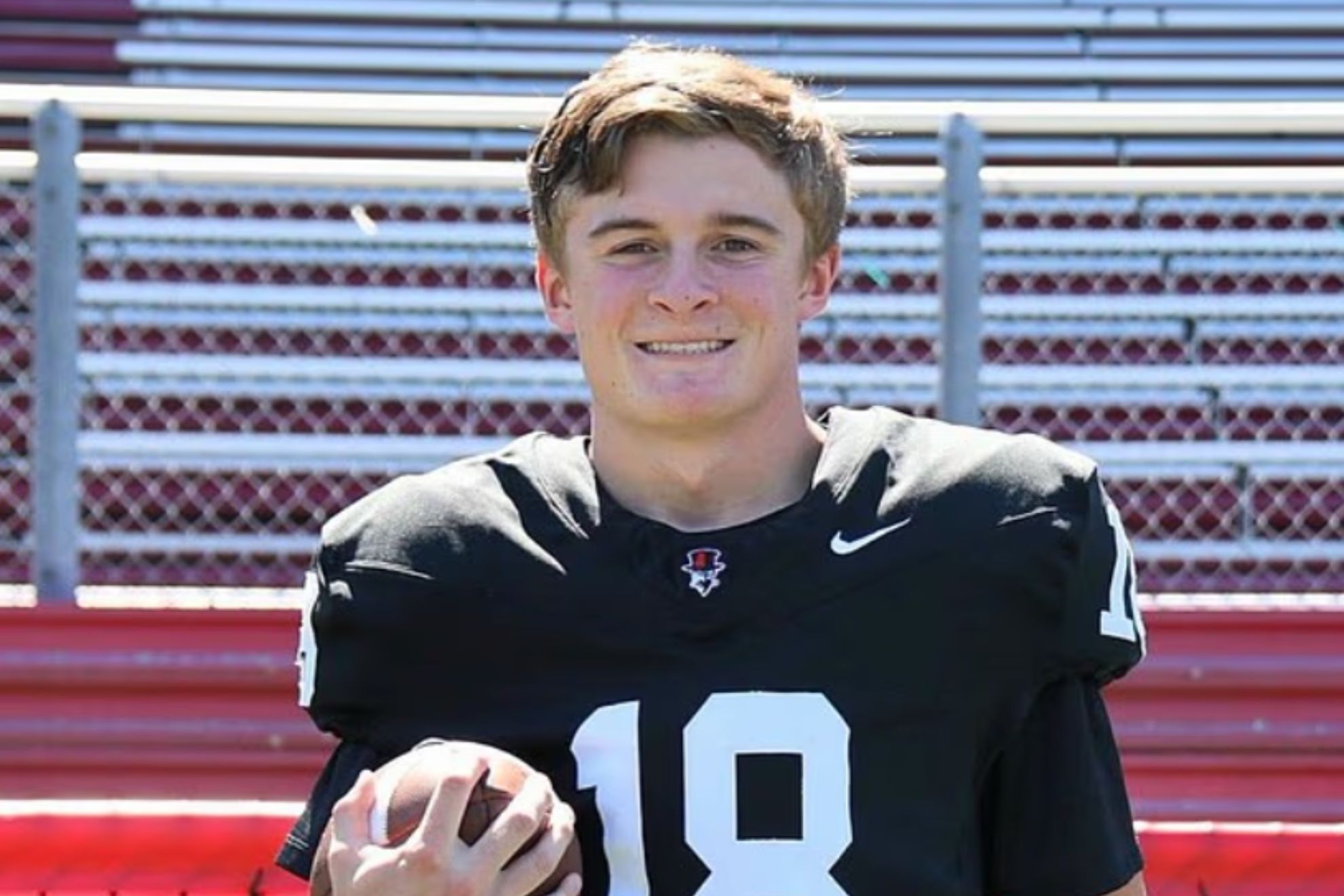 Owen Coyne smiles as he poses for a photo