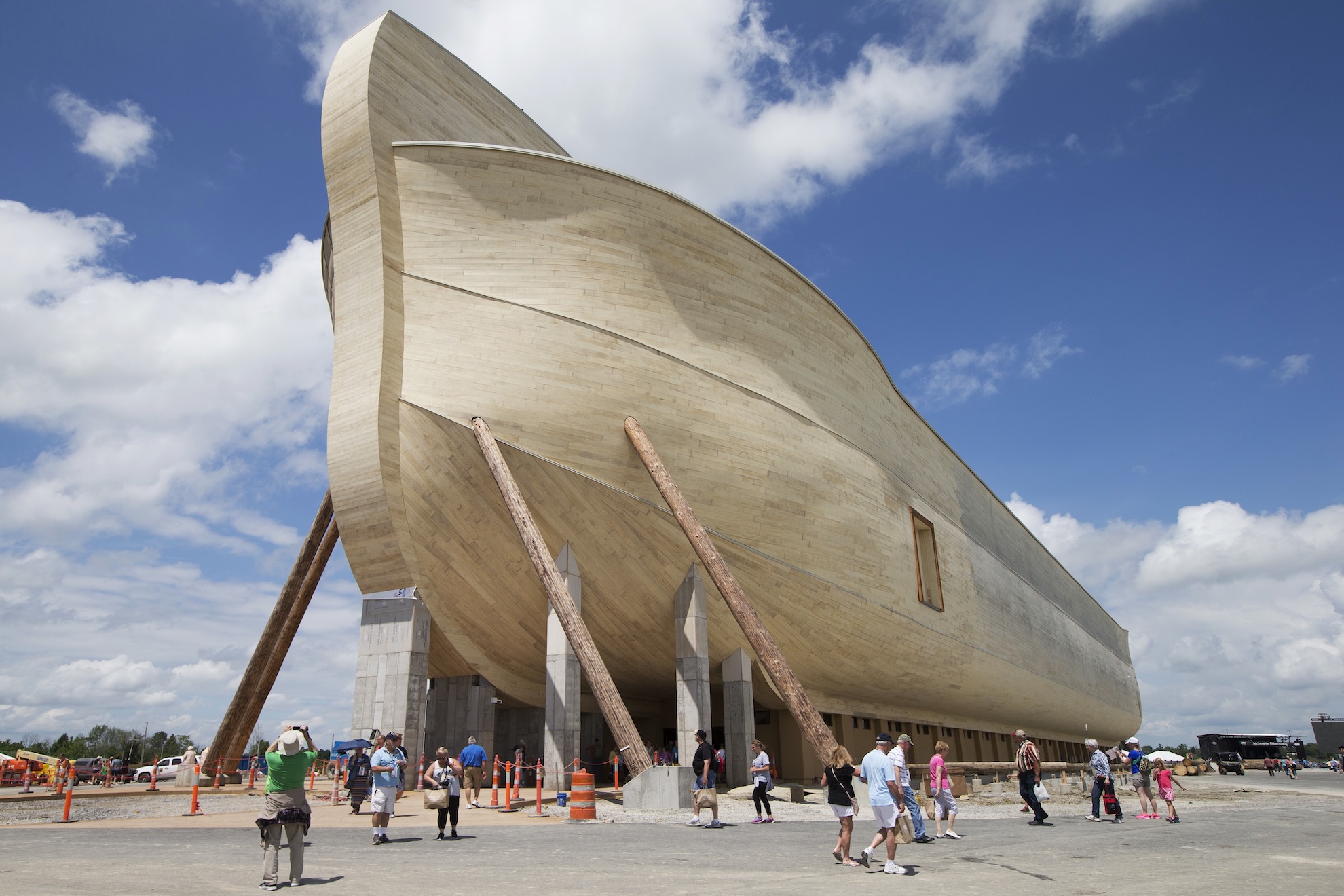 Visitors pass outside the front of a replica Noah's Ark at the Ark Encounter theme park in Williamstown, Ky LaPresse