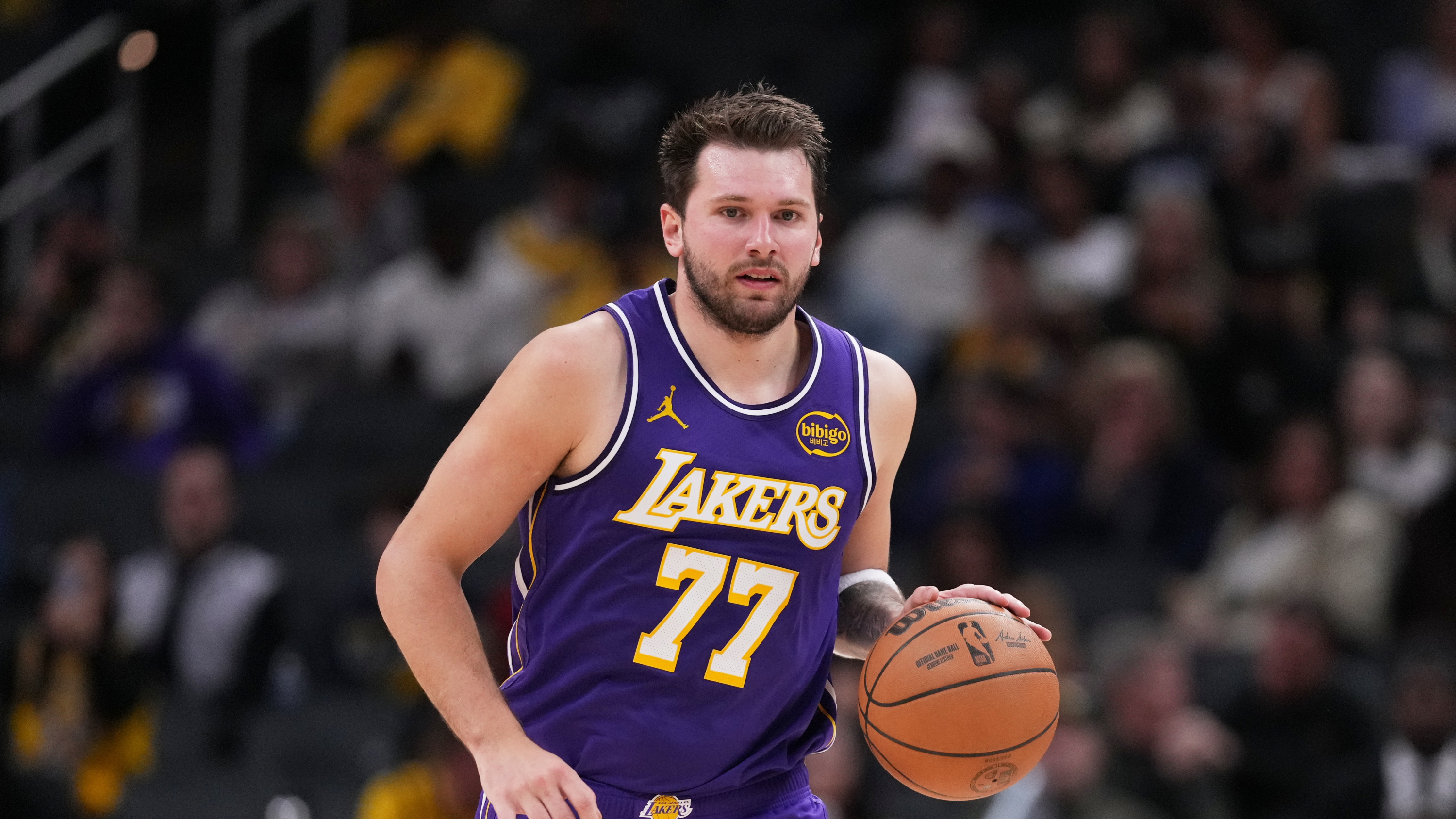 Los Angeles Lakers guard Luka Doncic (77) plays against the Indiana Pacers during the second half of an NBA basketball game in Indianapolis, Wednesday, March 25, 2026. (AP Photo/Michael Conroy) Michael Conroy