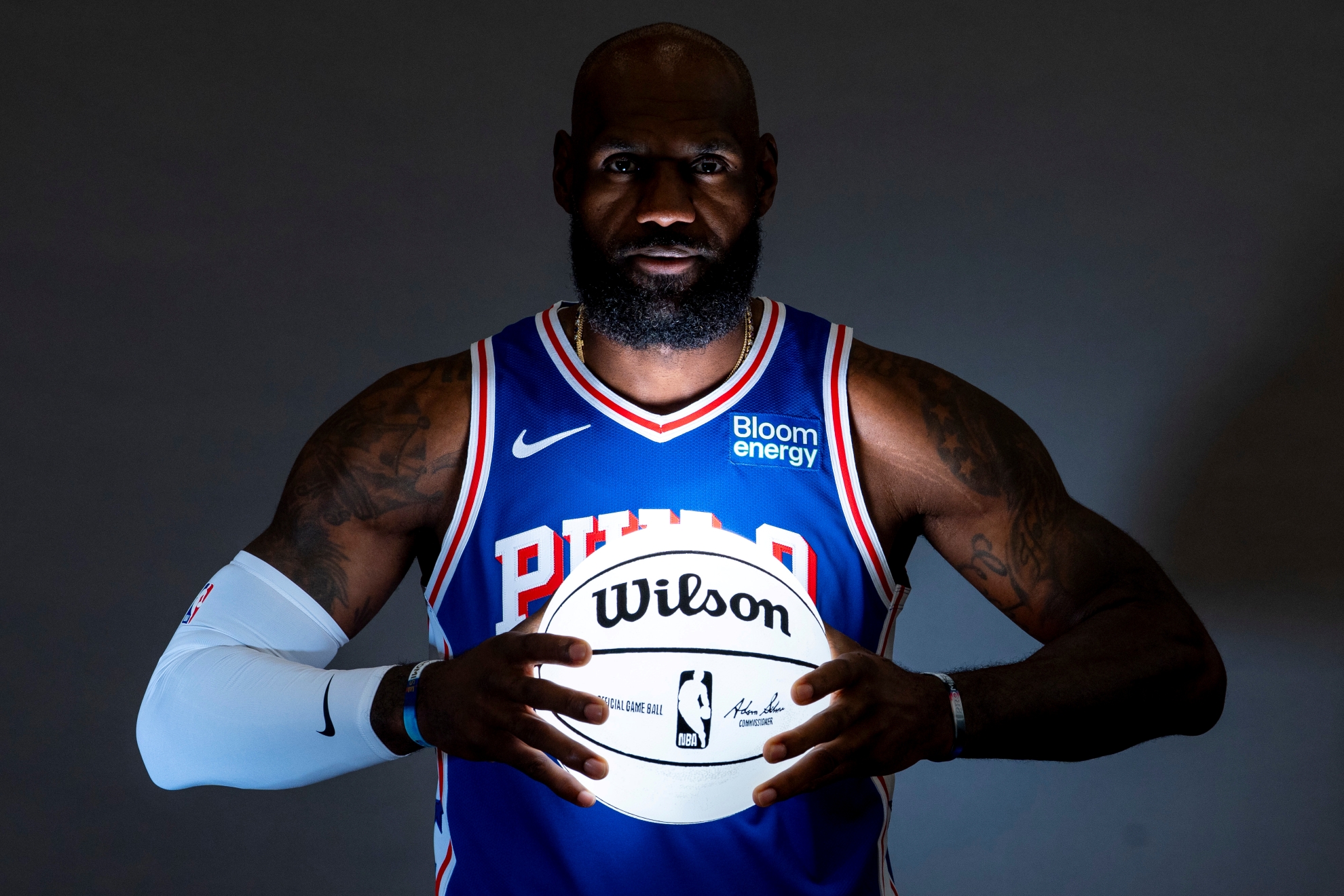Philadelphia 76ers' LeBron James poses for photos during the NBA basketball team's media day