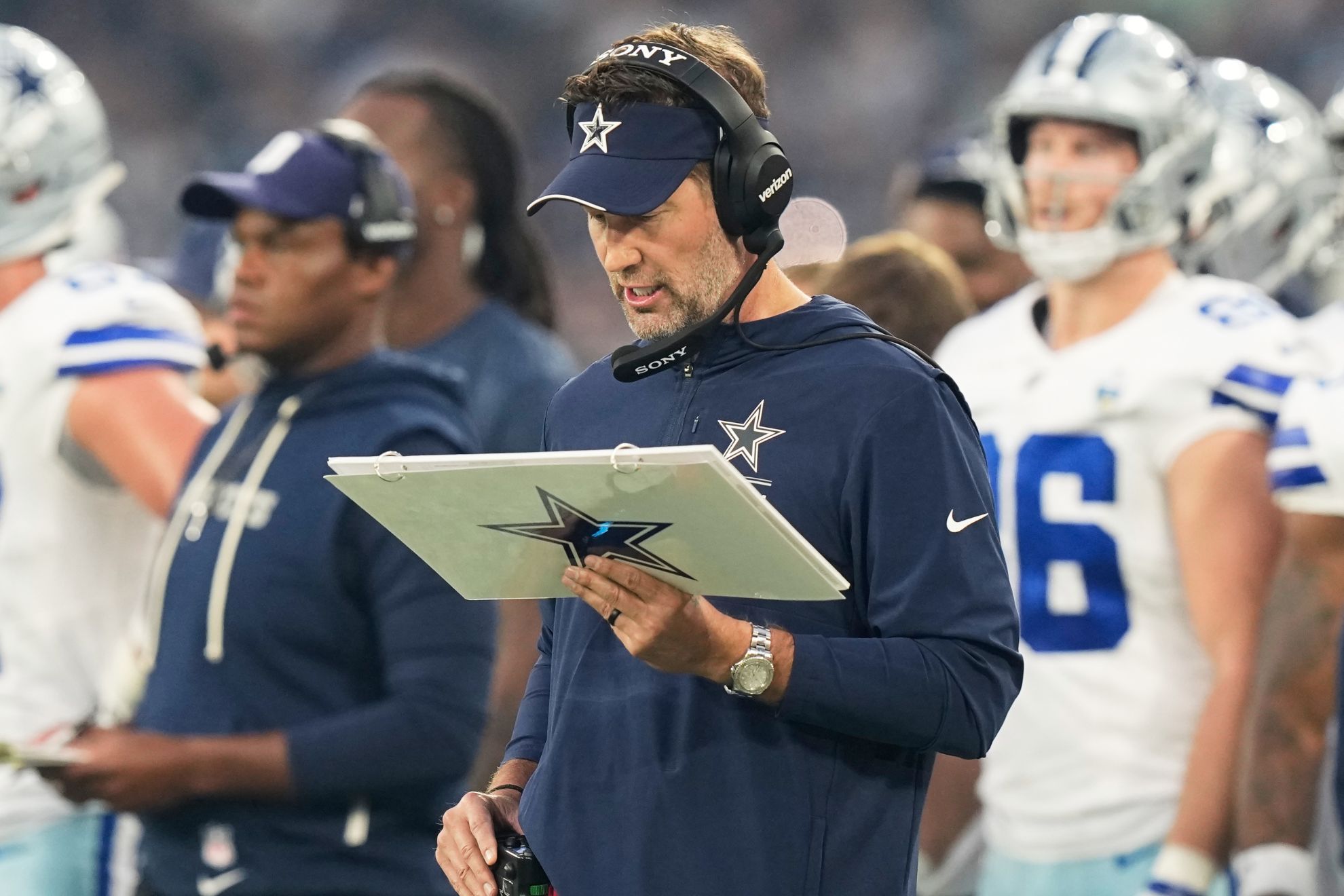 Dallas Cowboys head coach Brian Schottenheimer stands on the sideline