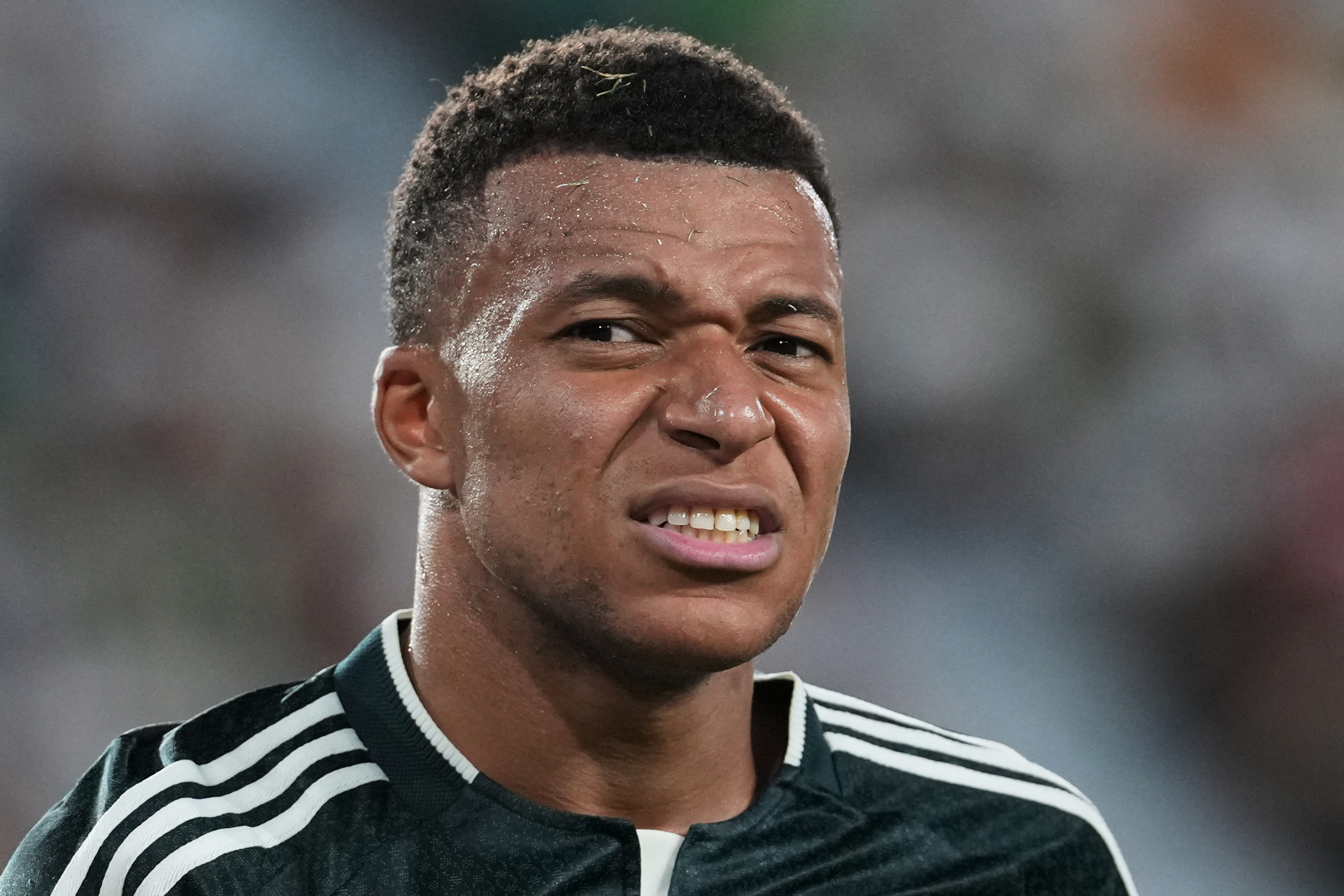 Real Madrid's Kylian Mbappe grimaces during the Spanish La Liga soccer match between Elche and Real Madrid in Elche. Alberto Saiz