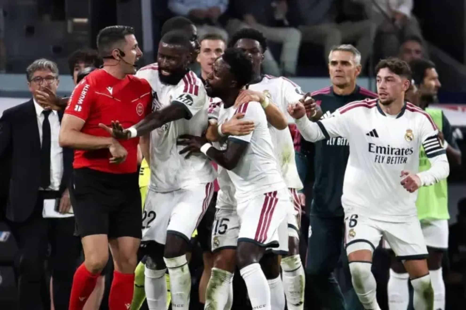 Vinicius is held back by his teammates after Diaz de Mera's red card LALIGA