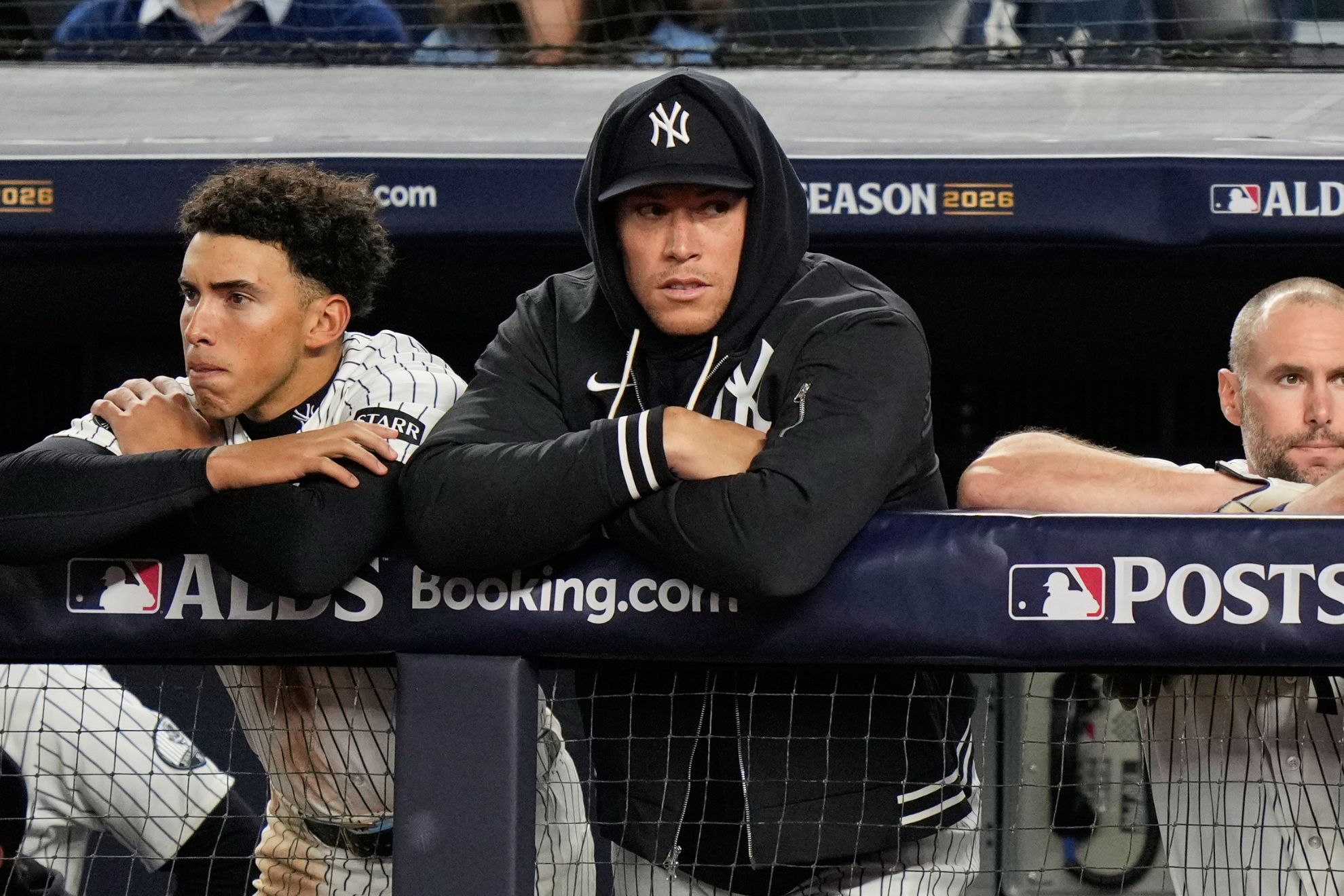 New York Yankees players watch play against the Tampa Bay Rays during the seventh inning in Game 3 of baseball's American League Division Series, Wednesday, Oct. 7, 2026, in New York.