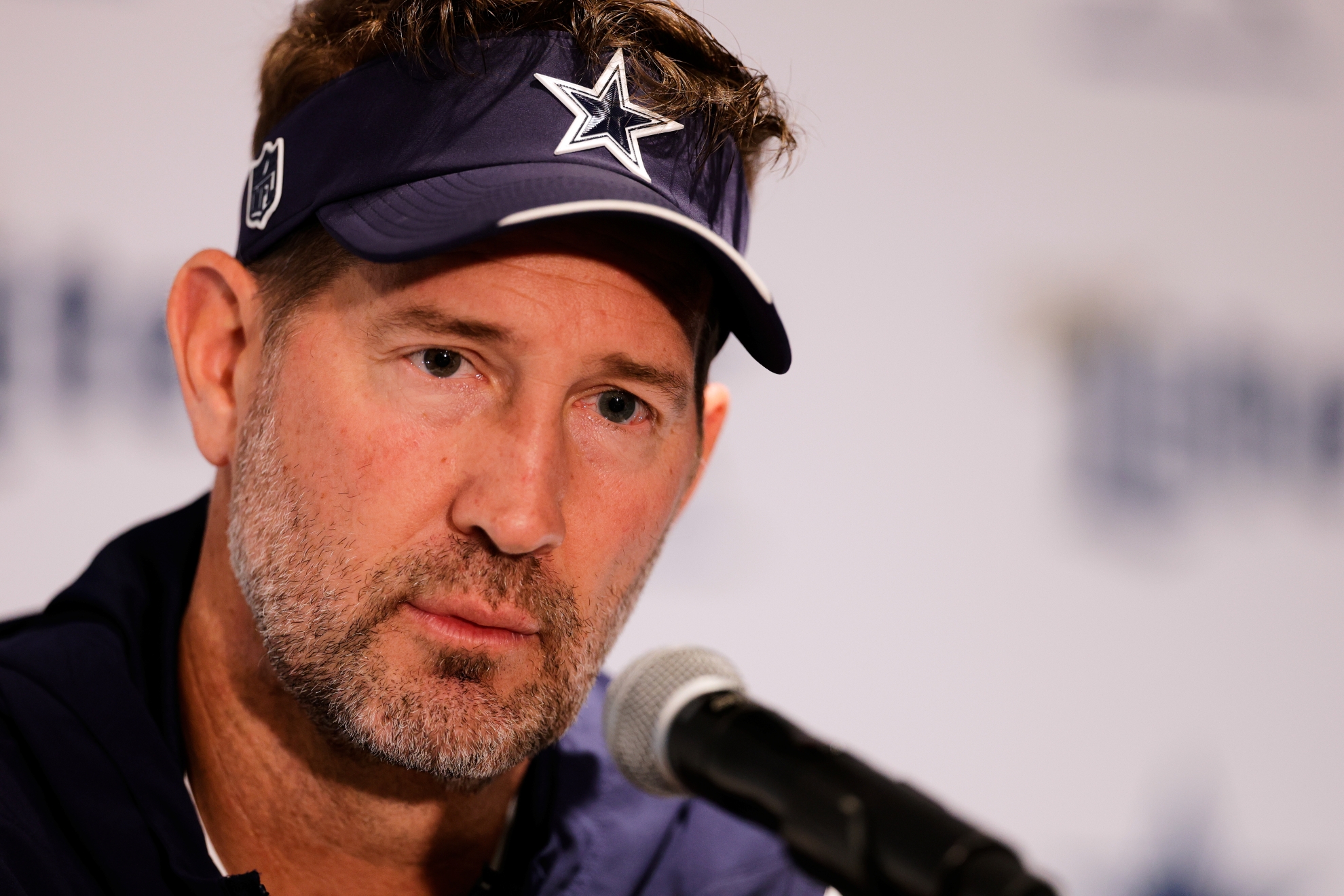 Dallas Cowboys head coach Brian Schottenheimer speaks during a practice