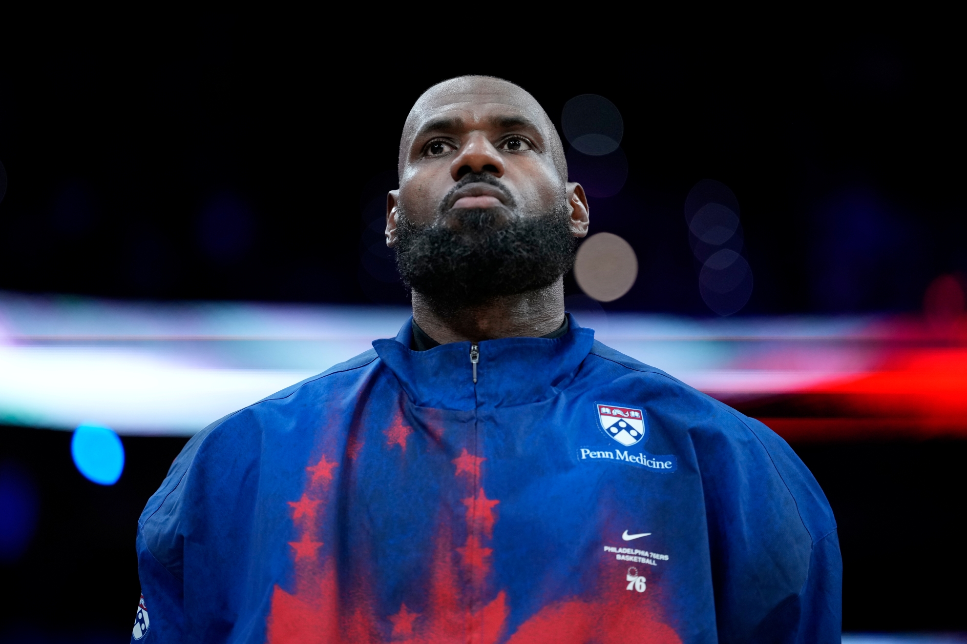 Philadelphia 76ers' LeBron James stands before a preseason NBA basketball game against the Boston Celtics