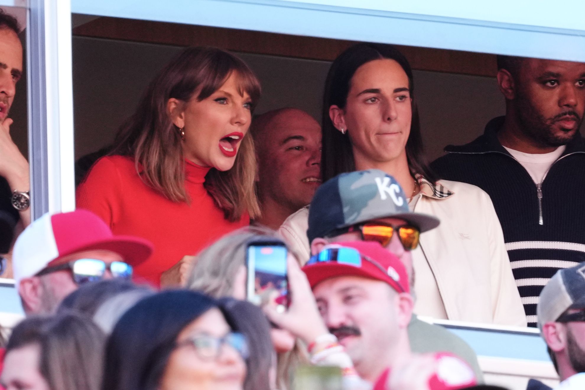 Taylor Swift, center left, and WNBA player Caitlin Clark