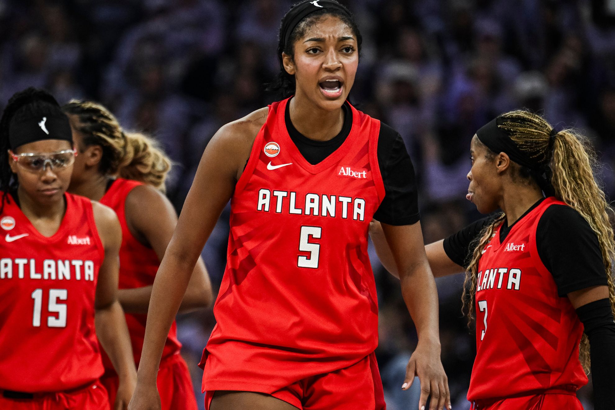 Atlanta Dream forward Angel Reese (5) reacts during the first half of Game 2