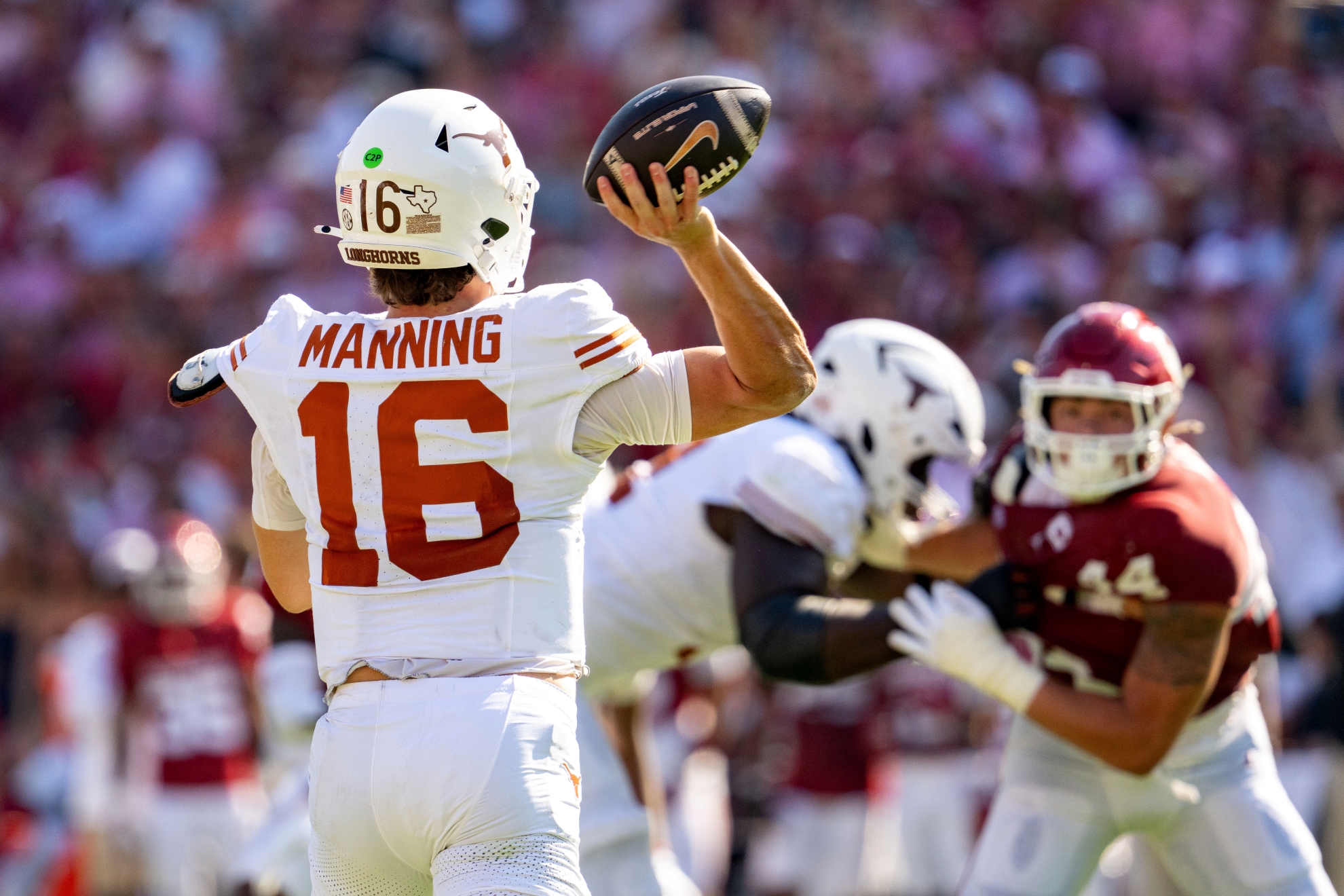 Texas quarterback Arch Manning throws a pass during the NCAA college football game against Oklahoma.