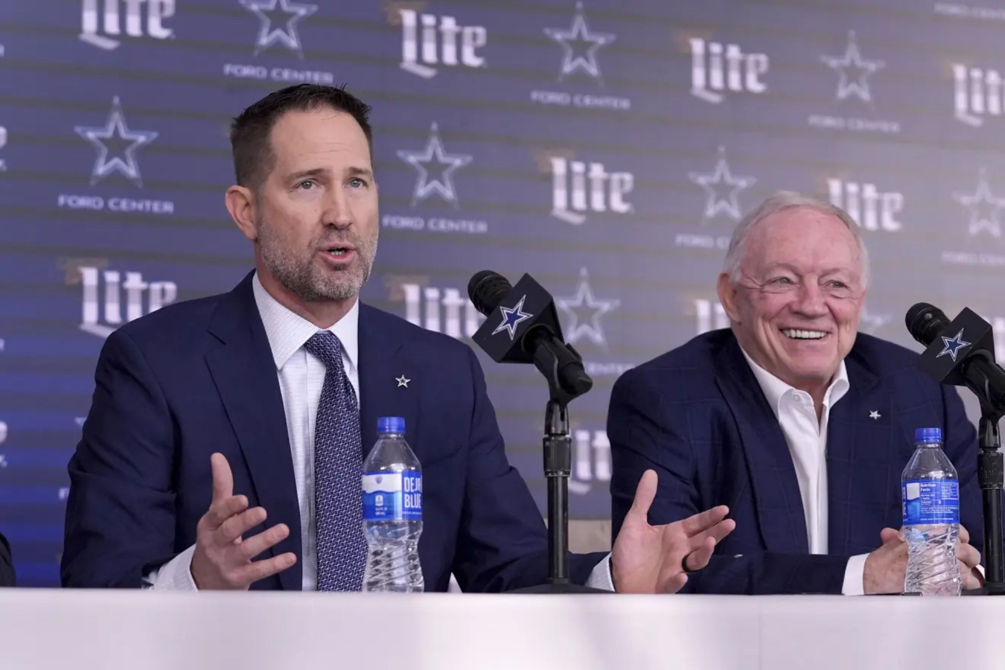 Brian Schottenheimer and Jerry Jones LAPRESSE